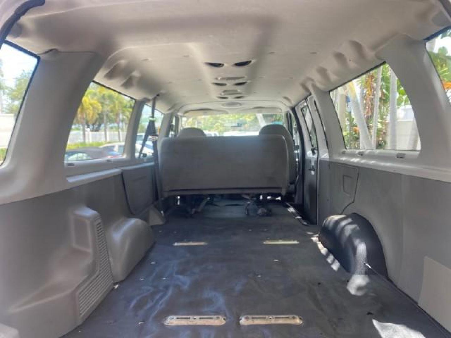 2005 Oxford White /Medium Flint Ford Econoline Wagon 5 PASSENGER XL LOW MILES 49,408 (1FBSS31L05H) with an 5.4L EFI V8 Engine engine, Automatic transmission, located at 4701 North Dixie Hwy, Pompano Beach, FL, 33064, (954) 422-2889, 26.240938, -80.123474 - OUR WEBPAGE FLORIDACARS1.COM HAS OVER 100 PHOTOS AND FREE CARFAX LINK 2005 FORD E-SERIES E-350 SD XLT 5PASSENGER VIN: 1FBSS31L05HA95671 1 F B S S 3 1 L 0 5 H A 9 5 6 7 1 VAN 5.4L V8 F GASOLINE REAR WHEEL DRIVE Top Features Rear Air Conditioning Third Row Seat Vinyl Seats Basic Features ABS Brakes AM - Photo#86