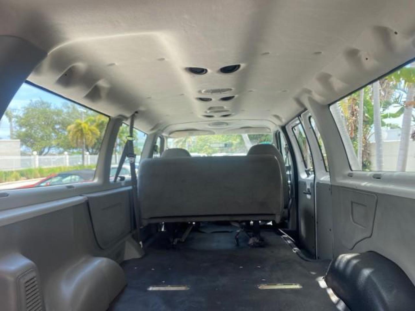 2005 Oxford White /Medium Flint Ford Econoline Wagon 5 PASSENGER XL LOW MILES 49,408 (1FBSS31L05H) with an 5.4L EFI V8 Engine engine, Automatic transmission, located at 4701 North Dixie Hwy, Pompano Beach, FL, 33064, (954) 422-2889, 26.240938, -80.123474 - OUR WEBPAGE FLORIDACARS1.COM HAS OVER 100 PHOTOS AND FREE CARFAX LINK 2005 FORD E-SERIES E-350 SD XLT 5PASSENGER VIN: 1FBSS31L05HA95671 1 F B S S 3 1 L 0 5 H A 9 5 6 7 1 VAN 5.4L V8 F GASOLINE REAR WHEEL DRIVE Top Features Rear Air Conditioning Third Row Seat Vinyl Seats Basic Features ABS Brakes AM - Photo#87