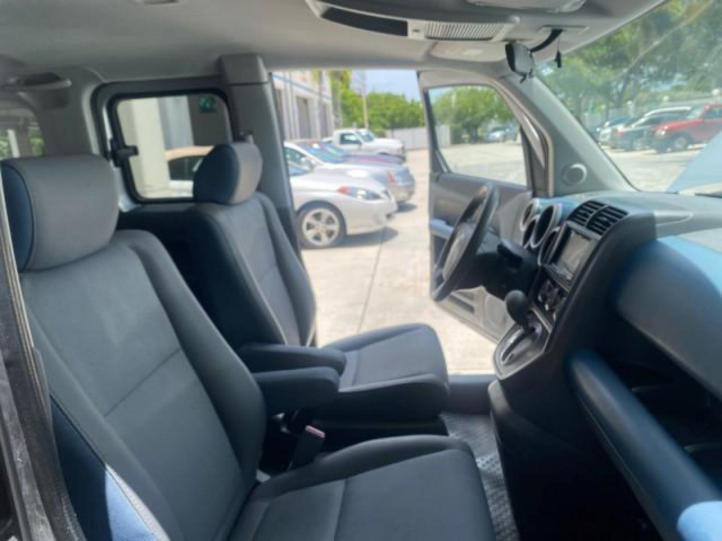 2006 Atomic Blue Metallic /Gray/Blue Honda Element EX LOW MILES 51,488 1 OWNER (5J6YH18666L) with an 2.4L DOHC MPFI 16-Valve i-VTEC I4 Engine engine, Automatic transmission, located at 4701 North Dixie Hwy, Pompano Beach, FL, 33064, (954) 422-2889, 26.240938, -80.123474 - OUR WEBPAGE FLORIDACARS1.COM HAS OVER 100 PHOTOS AND FREE CARFAX LINK 2006 HONDA ELEMENT EX AUTO CHECK 1 OWNER VIN: 5J6YH18666L014478 5 J 6 Y H 1 8 6 6 6 L 0 1 4 4 7 8 4 DOOR WAGON/SPORT UTILITY 2.4L I4 F DOHC 16V GASOLINE FRONT WHEEL DRIVE Top Features Alloy Wheels Bluetooth Technology Cloth Seats - Photo#12