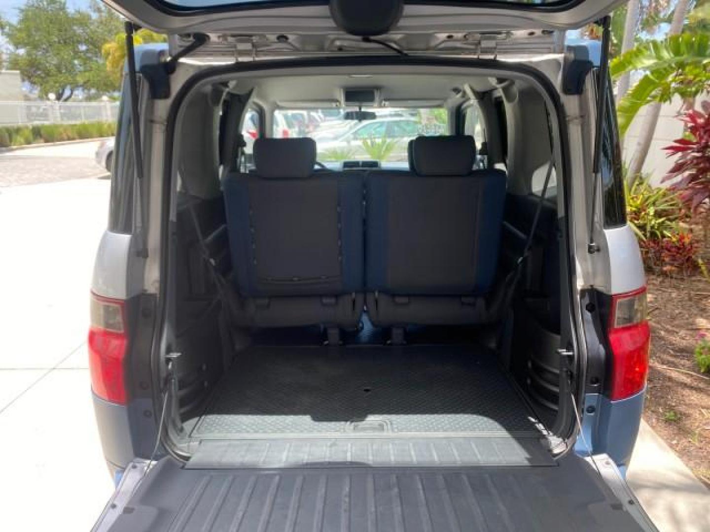2006 Atomic Blue Metallic /Gray/Blue Honda Element EX LOW MILES 51,488 1 OWNER (5J6YH18666L) with an 2.4L DOHC MPFI 16-Valve i-VTEC I4 Engine engine, Automatic transmission, located at 4701 North Dixie Hwy, Pompano Beach, FL, 33064, (954) 422-2889, 26.240938, -80.123474 - OUR WEBPAGE FLORIDACARS1.COM HAS OVER 100 PHOTOS AND FREE CARFAX LINK 2006 HONDA ELEMENT EX AUTO CHECK 1 OWNER VIN: 5J6YH18666L014478 5 J 6 Y H 1 8 6 6 6 L 0 1 4 4 7 8 4 DOOR WAGON/SPORT UTILITY 2.4L I4 F DOHC 16V GASOLINE FRONT WHEEL DRIVE Top Features Alloy Wheels Bluetooth Technology Cloth Seats - Photo#80