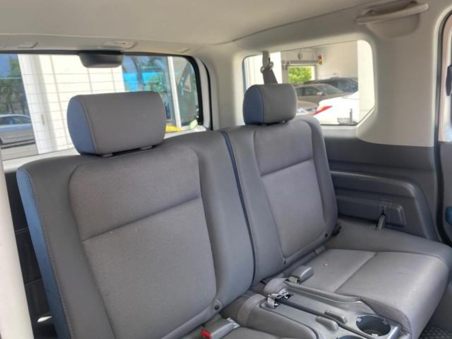 2006 Atomic Blue Metallic /Gray/Blue Honda Element EX LOW MILES 51,488 1 OWNER (5J6YH18666L) with an 2.4L DOHC MPFI 16-Valve i-VTEC I4 Engine engine, Automatic transmission, located at 4701 North Dixie Hwy, Pompano Beach, FL, 33064, (954) 422-2889, 26.240938, -80.123474 - OUR WEBPAGE FLORIDACARS1.COM HAS OVER 100 PHOTOS AND FREE CARFAX LINK 2006 HONDA ELEMENT EX AUTO CHECK 1 OWNER VIN: 5J6YH18666L014478 5 J 6 Y H 1 8 6 6 6 L 0 1 4 4 7 8 4 DOOR WAGON/SPORT UTILITY 2.4L I4 F DOHC 16V GASOLINE FRONT WHEEL DRIVE Top Features Alloy Wheels Bluetooth Technology Cloth Seats - Photo#89