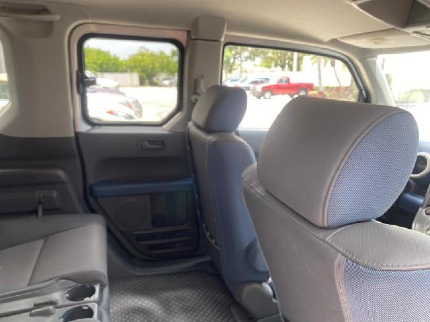 2006 Atomic Blue Metallic /Gray/Blue Honda Element EX LOW MILES 51,488 1 OWNER (5J6YH18666L) with an 2.4L DOHC MPFI 16-Valve i-VTEC I4 Engine engine, Automatic transmission, located at 4701 North Dixie Hwy, Pompano Beach, FL, 33064, (954) 422-2889, 26.240938, -80.123474 - OUR WEBPAGE FLORIDACARS1.COM HAS OVER 100 PHOTOS AND FREE CARFAX LINK 2006 HONDA ELEMENT EX AUTO CHECK 1 OWNER VIN: 5J6YH18666L014478 5 J 6 Y H 1 8 6 6 6 L 0 1 4 4 7 8 4 DOOR WAGON/SPORT UTILITY 2.4L I4 F DOHC 16V GASOLINE FRONT WHEEL DRIVE Top Features Alloy Wheels Bluetooth Technology Cloth Seats - Photo#91