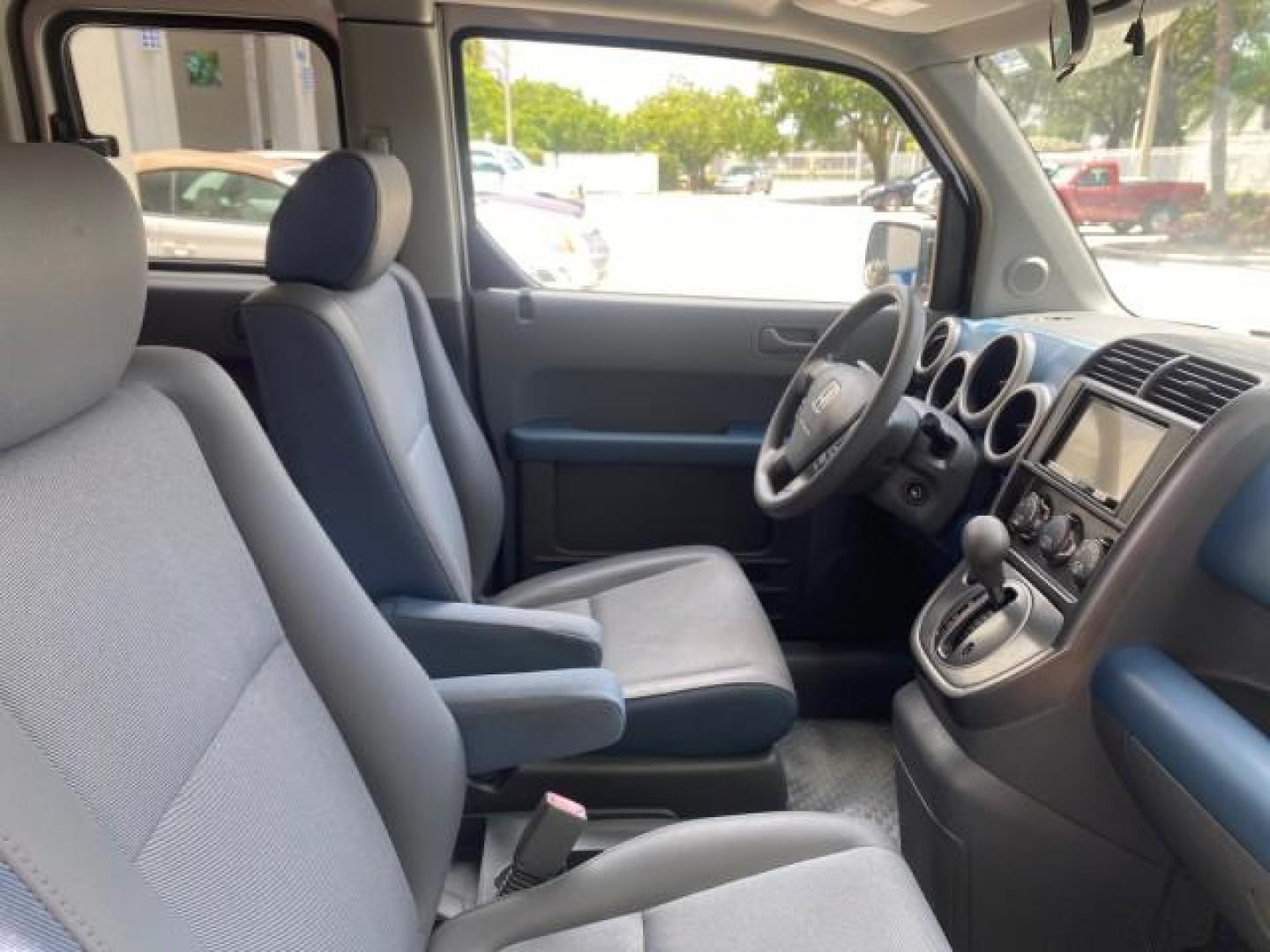 2006 Atomic Blue Metallic /Gray/Blue Honda Element EX LOW MILES 51,488 1 OWNER (5J6YH18666L) with an 2.4L DOHC MPFI 16-Valve i-VTEC I4 Engine engine, Automatic transmission, located at 4701 North Dixie Hwy, Pompano Beach, FL, 33064, (954) 422-2889, 26.240938, -80.123474 - OUR WEBPAGE FLORIDACARS1.COM HAS OVER 100 PHOTOS AND FREE CARFAX LINK 2006 HONDA ELEMENT EX AUTO CHECK 1 OWNER VIN: 5J6YH18666L014478 5 J 6 Y H 1 8 6 6 6 L 0 1 4 4 7 8 4 DOOR WAGON/SPORT UTILITY 2.4L I4 F DOHC 16V GASOLINE FRONT WHEEL DRIVE Top Features Alloy Wheels Bluetooth Technology Cloth Seats - Photo#97