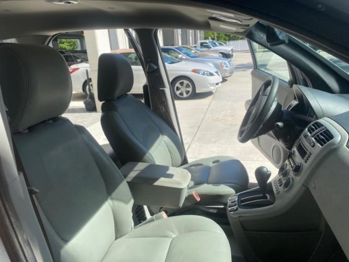 2005 Galaxy Silver Metallic /Light Gray Chevrolet Equinox LT LOW MILES 62,448 (2CNDL63F956) with an 3.4L 3400 V6 Engine engine, Automatic transmission, located at 4701 North Dixie Hwy, Pompano Beach, FL, 33064, (954) 422-2889, 26.240938, -80.123474 - OUR WEBPAGE FLORIDACARS1.COM HAS OVER 100 PHOTOS AND FREE CARFAX LINK 2005 CHEVROLET EQUINOX LT VIN: 2CNDL63F956029471 2 C N D L 6 3 F 9 5 6 0 2 9 4 7 1 4 DOOR WAGON/SPORT UTILITY 3.4L V6 F GASOLINE FRONT WHEEL DRIVE Top Features Alloy Wheels Leather Seats Basic Features ABS Brakes AM/FM Stereo Air - Photo#12
