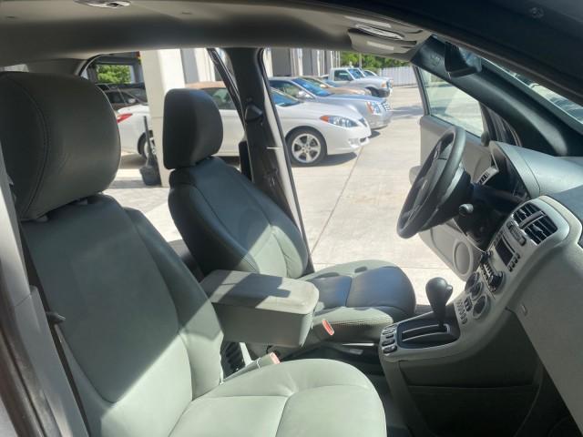 2005 Galaxy Silver Metallic /Light Gray Chevrolet Equinox LT LOW MILES 62,451 (2CNDL63F956) with an 3.4L 3400 V6 Engine engine, Automatic transmission, located at 4701 North Dixie Hwy, Pompano Beach, FL, 33064, (954) 422-2889, 26.240938, -80.123474 - OUR WEBPAGE FLORIDACARS1.COM HAS OVER 100 PHOTOS AND FREE CARFAX LINK 2005 CHEVROLET EQUINOX LT VIN: 2CNDL63F956029471 2 C N D L 6 3 F 9 5 6 0 2 9 4 7 1 4 DOOR WAGON/SPORT UTILITY 3.4L V6 F GASOLINE FRONT WHEEL DRIVE Top Features Alloy Wheels Leather Seats Basic Features ABS Brakes AM/FM Stereo Air - Photo#12