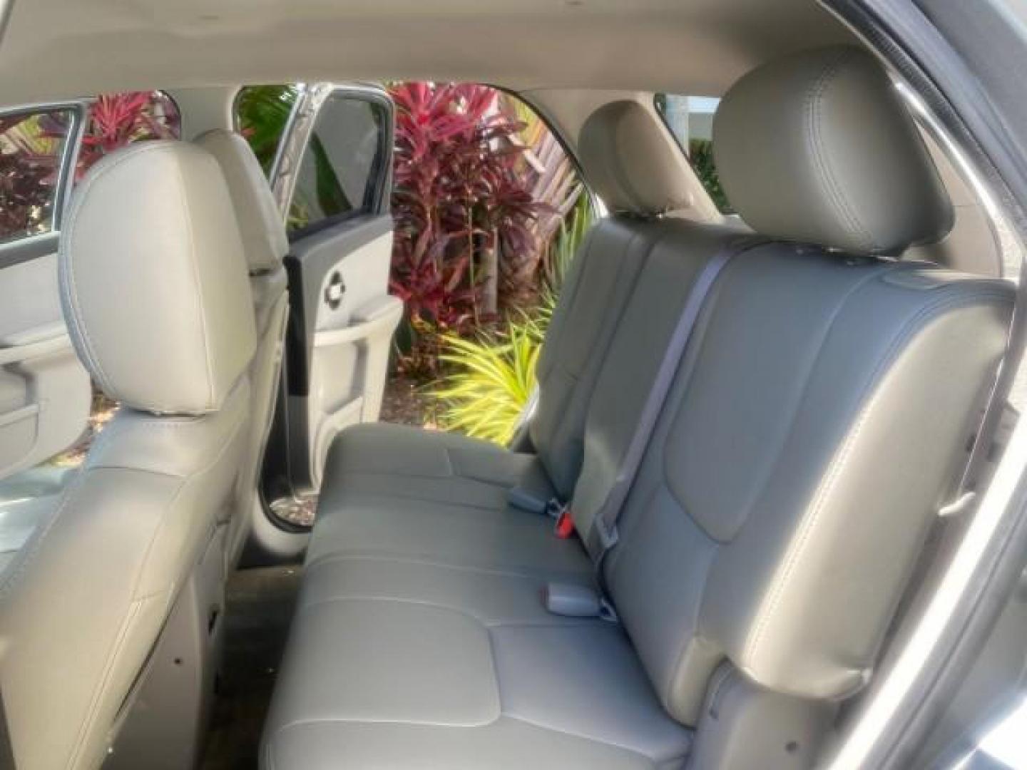 2005 Galaxy Silver Metallic /Light Gray Chevrolet Equinox LT LOW MILES 62,448 (2CNDL63F956) with an 3.4L 3400 V6 Engine engine, Automatic transmission, located at 4701 North Dixie Hwy, Pompano Beach, FL, 33064, (954) 422-2889, 26.240938, -80.123474 - OUR WEBPAGE FLORIDACARS1.COM HAS OVER 100 PHOTOS AND FREE CARFAX LINK 2005 CHEVROLET EQUINOX LT VIN: 2CNDL63F956029471 2 C N D L 6 3 F 9 5 6 0 2 9 4 7 1 4 DOOR WAGON/SPORT UTILITY 3.4L V6 F GASOLINE FRONT WHEEL DRIVE Top Features Alloy Wheels Leather Seats Basic Features ABS Brakes AM/FM Stereo Air - Photo#14