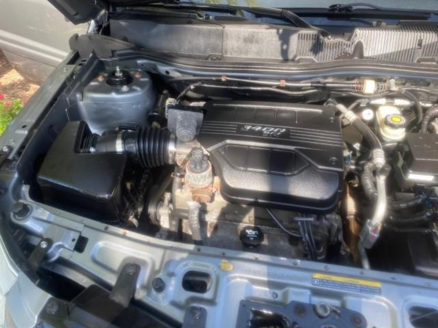 2005 Galaxy Silver Metallic /Light Gray Chevrolet Equinox LT LOW MILES 62,448 (2CNDL63F956) with an 3.4L 3400 V6 Engine engine, Automatic transmission, located at 4701 North Dixie Hwy, Pompano Beach, FL, 33064, (954) 422-2889, 26.240938, -80.123474 - OUR WEBPAGE FLORIDACARS1.COM HAS OVER 100 PHOTOS AND FREE CARFAX LINK 2005 CHEVROLET EQUINOX LT VIN: 2CNDL63F956029471 2 C N D L 6 3 F 9 5 6 0 2 9 4 7 1 4 DOOR WAGON/SPORT UTILITY 3.4L V6 F GASOLINE FRONT WHEEL DRIVE Top Features Alloy Wheels Leather Seats Basic Features ABS Brakes AM/FM Stereo Air - Photo#25