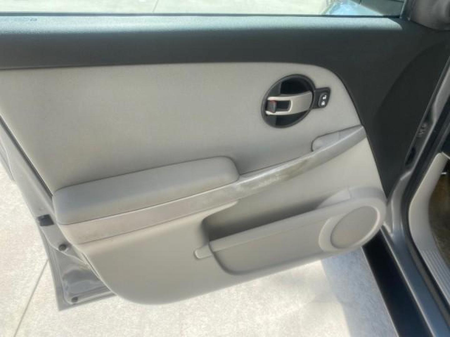 2005 Galaxy Silver Metallic /Light Gray Chevrolet Equinox LT LOW MILES 62,448 (2CNDL63F956) with an 3.4L 3400 V6 Engine engine, Automatic transmission, located at 4701 North Dixie Hwy, Pompano Beach, FL, 33064, (954) 422-2889, 26.240938, -80.123474 - OUR WEBPAGE FLORIDACARS1.COM HAS OVER 100 PHOTOS AND FREE CARFAX LINK 2005 CHEVROLET EQUINOX LT VIN: 2CNDL63F956029471 2 C N D L 6 3 F 9 5 6 0 2 9 4 7 1 4 DOOR WAGON/SPORT UTILITY 3.4L V6 F GASOLINE FRONT WHEEL DRIVE Top Features Alloy Wheels Leather Seats Basic Features ABS Brakes AM/FM Stereo Air - Photo#31
