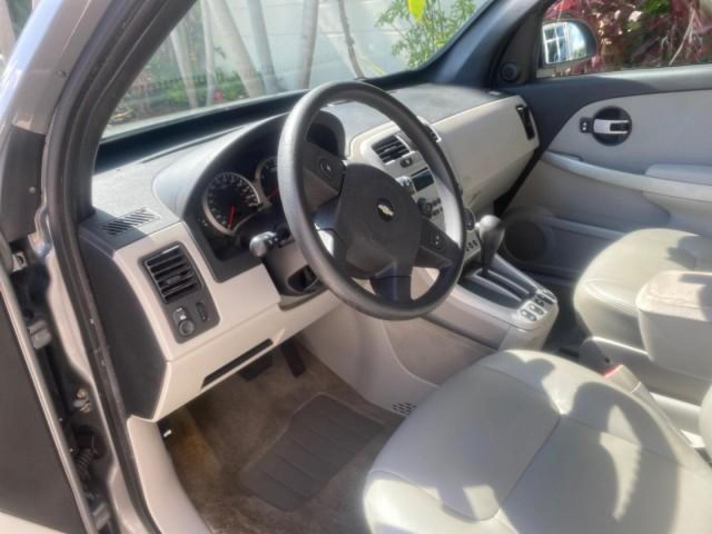 2005 Galaxy Silver Metallic /Light Gray Chevrolet Equinox LT LOW MILES 62,448 (2CNDL63F956) with an 3.4L 3400 V6 Engine engine, Automatic transmission, located at 4701 North Dixie Hwy, Pompano Beach, FL, 33064, (954) 422-2889, 26.240938, -80.123474 - OUR WEBPAGE FLORIDACARS1.COM HAS OVER 100 PHOTOS AND FREE CARFAX LINK 2005 CHEVROLET EQUINOX LT VIN: 2CNDL63F956029471 2 C N D L 6 3 F 9 5 6 0 2 9 4 7 1 4 DOOR WAGON/SPORT UTILITY 3.4L V6 F GASOLINE FRONT WHEEL DRIVE Top Features Alloy Wheels Leather Seats Basic Features ABS Brakes AM/FM Stereo Air - Photo#36