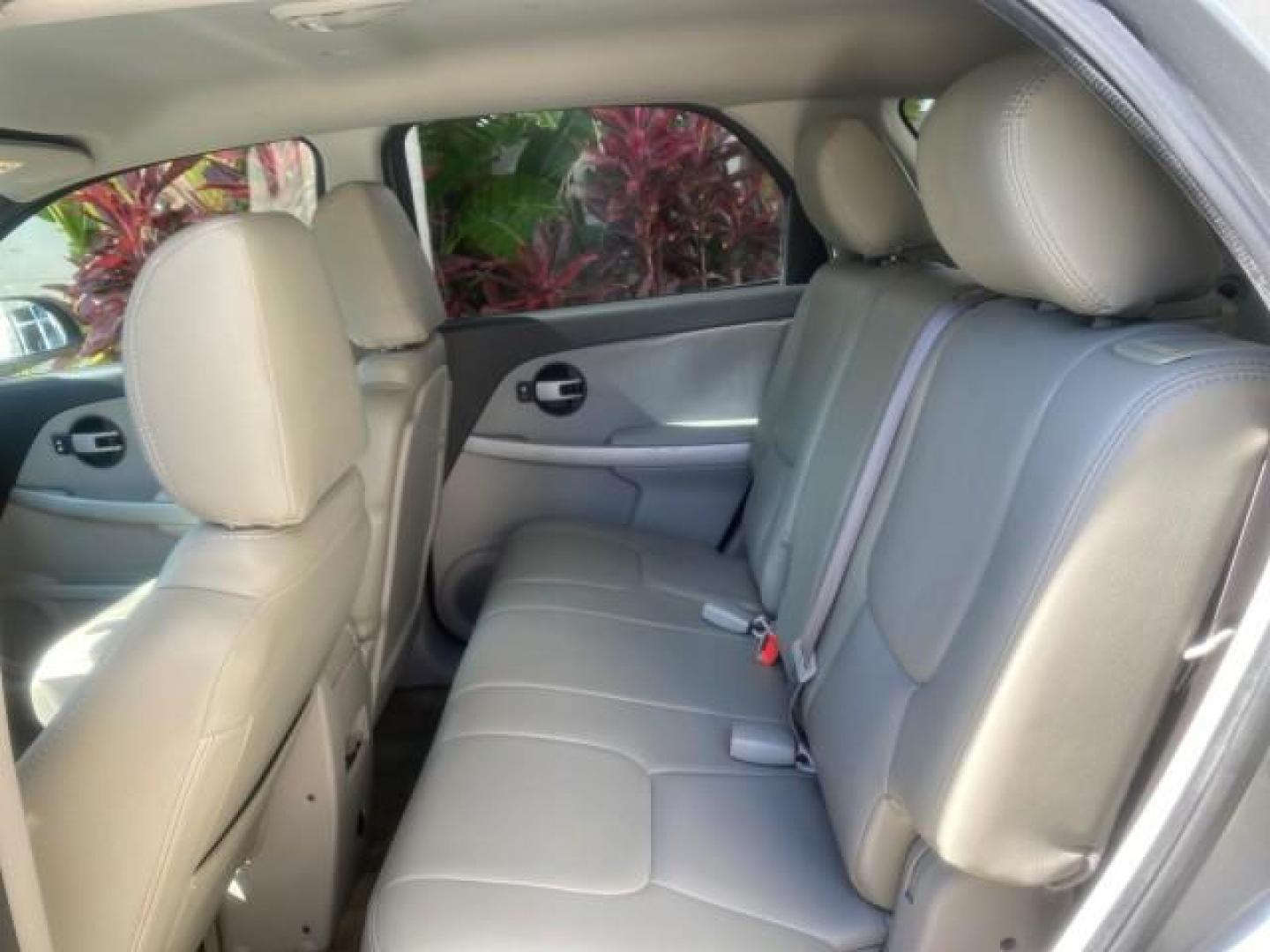 2005 Galaxy Silver Metallic /Light Gray Chevrolet Equinox LT LOW MILES 62,448 (2CNDL63F956) with an 3.4L 3400 V6 Engine engine, Automatic transmission, located at 4701 North Dixie Hwy, Pompano Beach, FL, 33064, (954) 422-2889, 26.240938, -80.123474 - OUR WEBPAGE FLORIDACARS1.COM HAS OVER 100 PHOTOS AND FREE CARFAX LINK 2005 CHEVROLET EQUINOX LT VIN: 2CNDL63F956029471 2 C N D L 6 3 F 9 5 6 0 2 9 4 7 1 4 DOOR WAGON/SPORT UTILITY 3.4L V6 F GASOLINE FRONT WHEEL DRIVE Top Features Alloy Wheels Leather Seats Basic Features ABS Brakes AM/FM Stereo Air - Photo#66