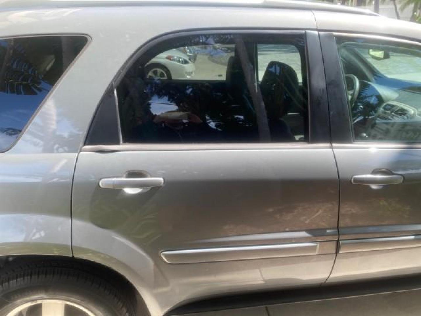 2005 Galaxy Silver Metallic /Light Gray Chevrolet Equinox LT LOW MILES 62,448 (2CNDL63F956) with an 3.4L 3400 V6 Engine engine, Automatic transmission, located at 4701 North Dixie Hwy, Pompano Beach, FL, 33064, (954) 422-2889, 26.240938, -80.123474 - OUR WEBPAGE FLORIDACARS1.COM HAS OVER 100 PHOTOS AND FREE CARFAX LINK 2005 CHEVROLET EQUINOX LT VIN: 2CNDL63F956029471 2 C N D L 6 3 F 9 5 6 0 2 9 4 7 1 4 DOOR WAGON/SPORT UTILITY 3.4L V6 F GASOLINE FRONT WHEEL DRIVE Top Features Alloy Wheels Leather Seats Basic Features ABS Brakes AM/FM Stereo Air - Photo#87