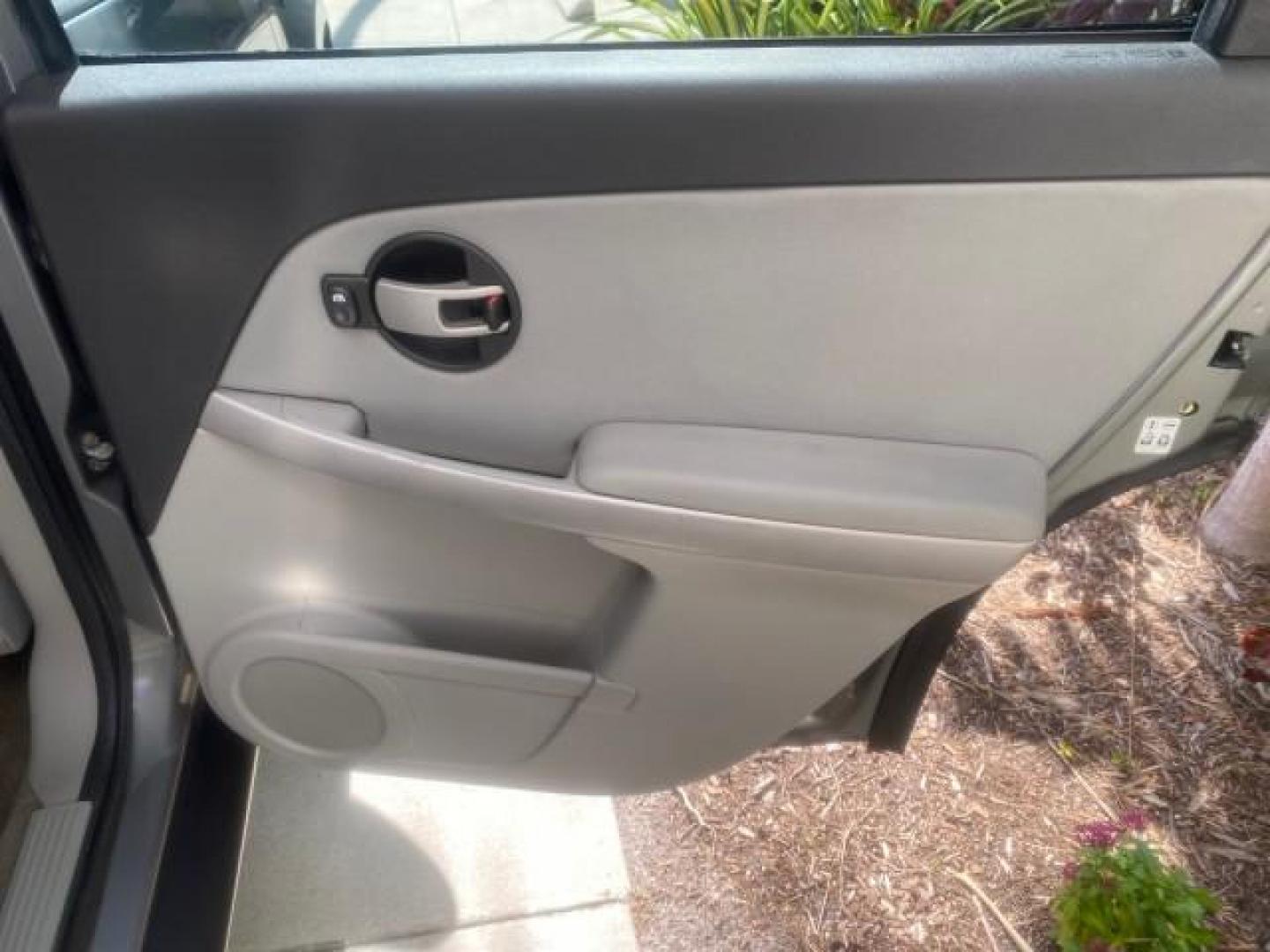 2005 Galaxy Silver Metallic /Light Gray Chevrolet Equinox LT LOW MILES 62,448 (2CNDL63F956) with an 3.4L 3400 V6 Engine engine, Automatic transmission, located at 4701 North Dixie Hwy, Pompano Beach, FL, 33064, (954) 422-2889, 26.240938, -80.123474 - OUR WEBPAGE FLORIDACARS1.COM HAS OVER 100 PHOTOS AND FREE CARFAX LINK 2005 CHEVROLET EQUINOX LT VIN: 2CNDL63F956029471 2 C N D L 6 3 F 9 5 6 0 2 9 4 7 1 4 DOOR WAGON/SPORT UTILITY 3.4L V6 F GASOLINE FRONT WHEEL DRIVE Top Features Alloy Wheels Leather Seats Basic Features ABS Brakes AM/FM Stereo Air - Photo#89