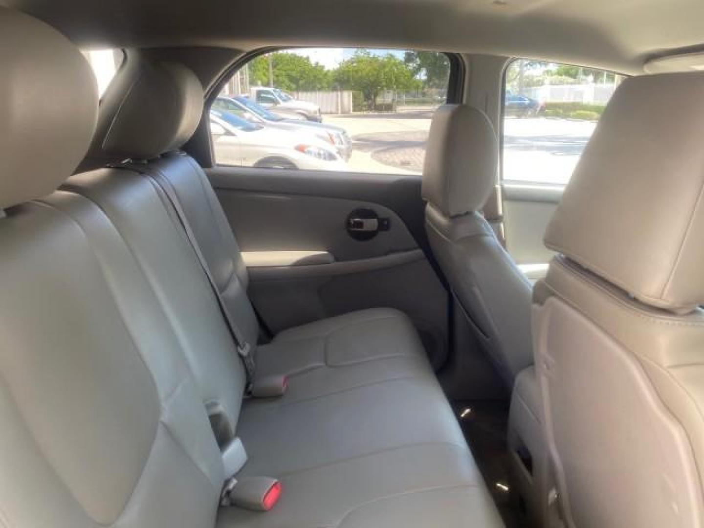 2005 Galaxy Silver Metallic /Light Gray Chevrolet Equinox LT LOW MILES 62,448 (2CNDL63F956) with an 3.4L 3400 V6 Engine engine, Automatic transmission, located at 4701 North Dixie Hwy, Pompano Beach, FL, 33064, (954) 422-2889, 26.240938, -80.123474 - OUR WEBPAGE FLORIDACARS1.COM HAS OVER 100 PHOTOS AND FREE CARFAX LINK 2005 CHEVROLET EQUINOX LT VIN: 2CNDL63F956029471 2 C N D L 6 3 F 9 5 6 0 2 9 4 7 1 4 DOOR WAGON/SPORT UTILITY 3.4L V6 F GASOLINE FRONT WHEEL DRIVE Top Features Alloy Wheels Leather Seats Basic Features ABS Brakes AM/FM Stereo Air - Photo#92