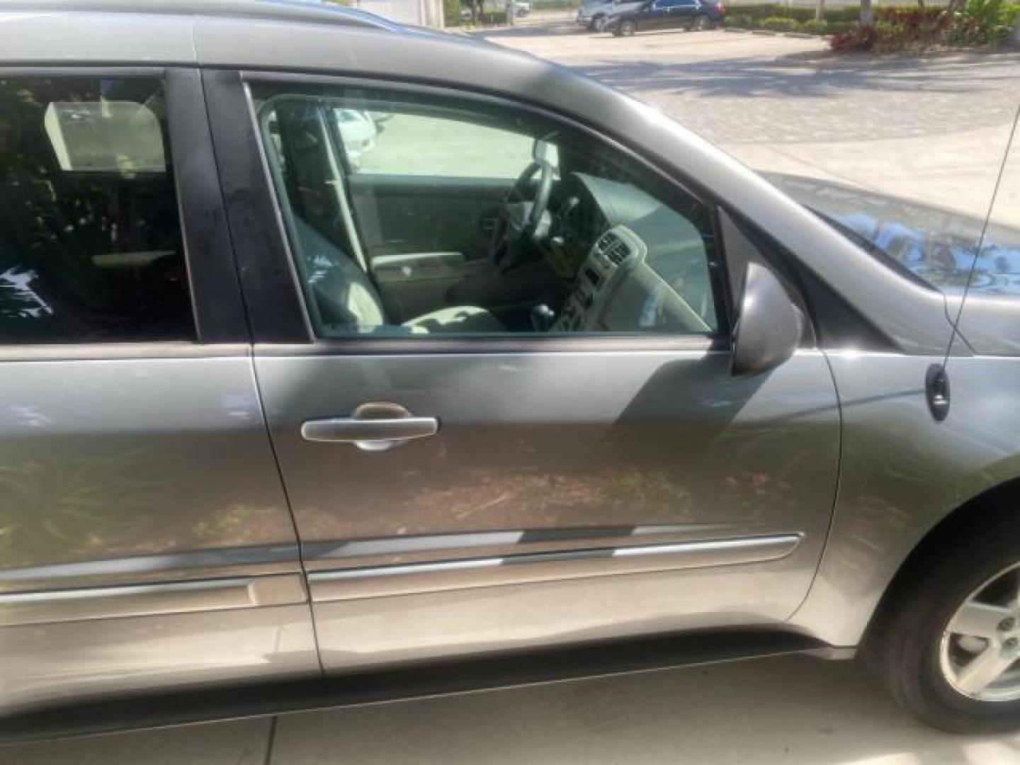 2005 Galaxy Silver Metallic /Light Gray Chevrolet Equinox LT LOW MILES 62,448 (2CNDL63F956) with an 3.4L 3400 V6 Engine engine, Automatic transmission, located at 4701 North Dixie Hwy, Pompano Beach, FL, 33064, (954) 422-2889, 26.240938, -80.123474 - OUR WEBPAGE FLORIDACARS1.COM HAS OVER 100 PHOTOS AND FREE CARFAX LINK 2005 CHEVROLET EQUINOX LT VIN: 2CNDL63F956029471 2 C N D L 6 3 F 9 5 6 0 2 9 4 7 1 4 DOOR WAGON/SPORT UTILITY 3.4L V6 F GASOLINE FRONT WHEEL DRIVE Top Features Alloy Wheels Leather Seats Basic Features ABS Brakes AM/FM Stereo Air - Photo#95