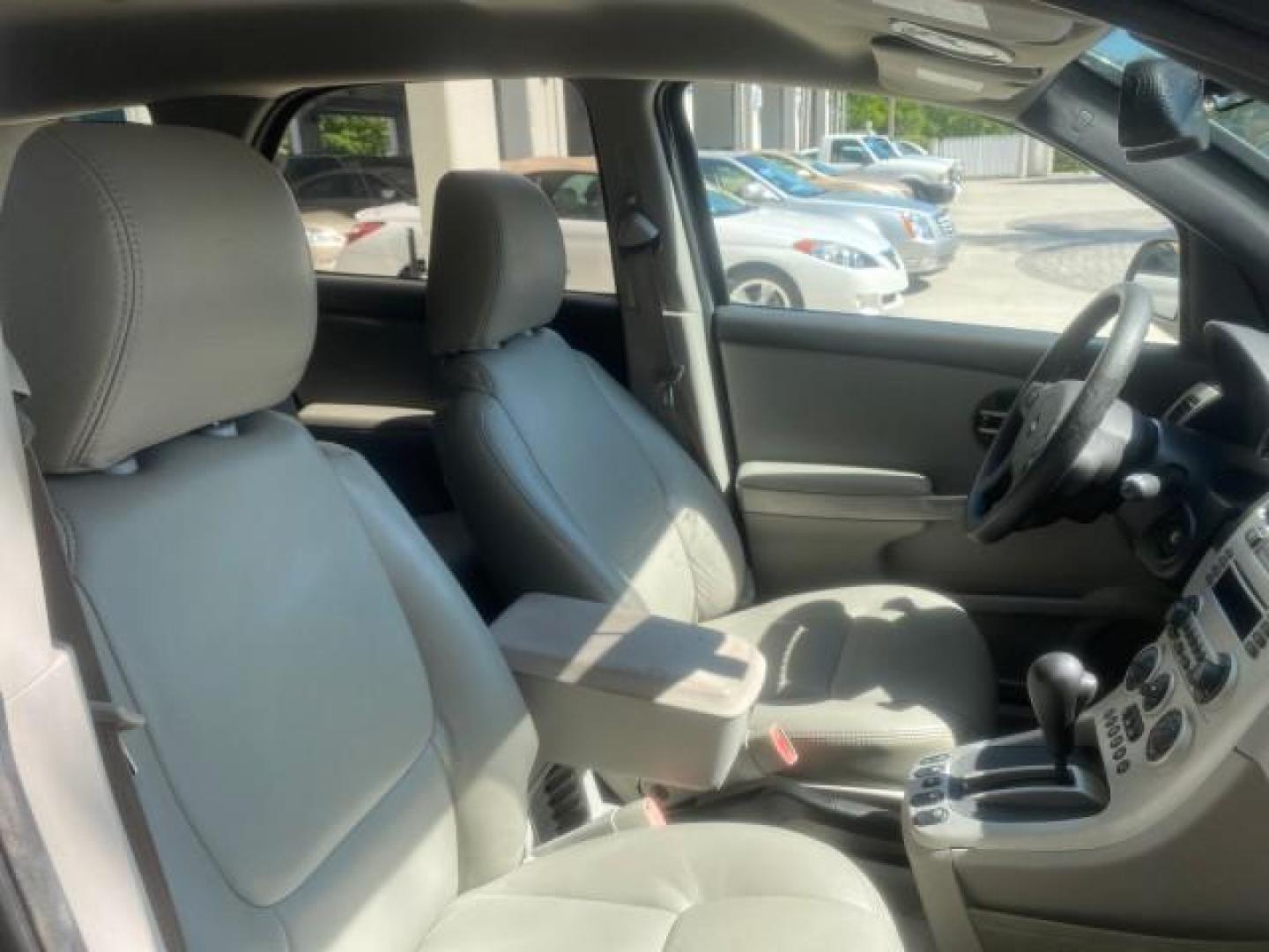 2005 Galaxy Silver Metallic /Light Gray Chevrolet Equinox LT LOW MILES 62,448 (2CNDL63F956) with an 3.4L 3400 V6 Engine engine, Automatic transmission, located at 4701 North Dixie Hwy, Pompano Beach, FL, 33064, (954) 422-2889, 26.240938, -80.123474 - OUR WEBPAGE FLORIDACARS1.COM HAS OVER 100 PHOTOS AND FREE CARFAX LINK 2005 CHEVROLET EQUINOX LT VIN: 2CNDL63F956029471 2 C N D L 6 3 F 9 5 6 0 2 9 4 7 1 4 DOOR WAGON/SPORT UTILITY 3.4L V6 F GASOLINE FRONT WHEEL DRIVE Top Features Alloy Wheels Leather Seats Basic Features ABS Brakes AM/FM Stereo Air - Photo#98