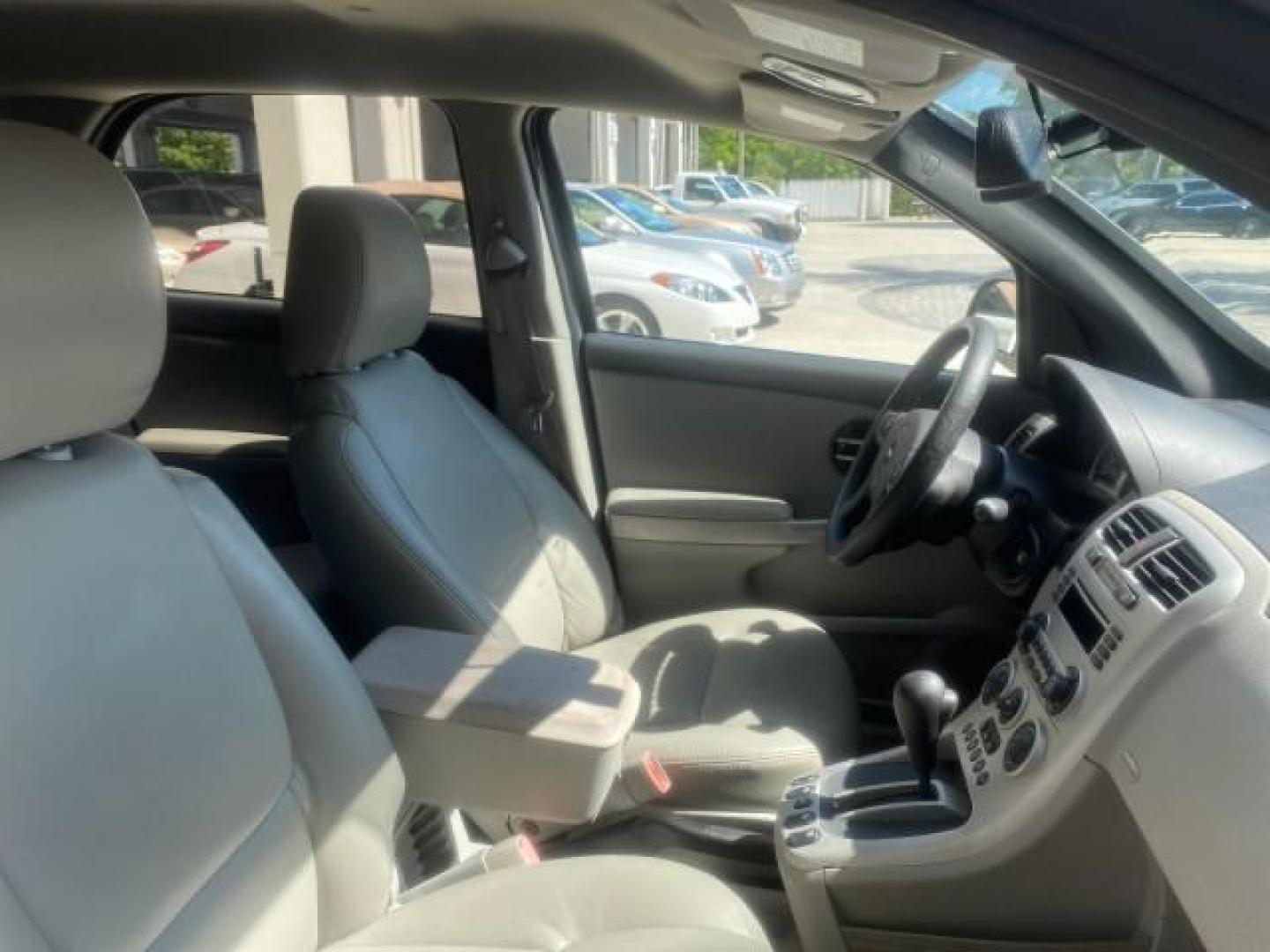 2005 Galaxy Silver Metallic /Light Gray Chevrolet Equinox LT LOW MILES 62,448 (2CNDL63F956) with an 3.4L 3400 V6 Engine engine, Automatic transmission, located at 4701 North Dixie Hwy, Pompano Beach, FL, 33064, (954) 422-2889, 26.240938, -80.123474 - OUR WEBPAGE FLORIDACARS1.COM HAS OVER 100 PHOTOS AND FREE CARFAX LINK 2005 CHEVROLET EQUINOX LT VIN: 2CNDL63F956029471 2 C N D L 6 3 F 9 5 6 0 2 9 4 7 1 4 DOOR WAGON/SPORT UTILITY 3.4L V6 F GASOLINE FRONT WHEEL DRIVE Top Features Alloy Wheels Leather Seats Basic Features ABS Brakes AM/FM Stereo Air - Photo#99