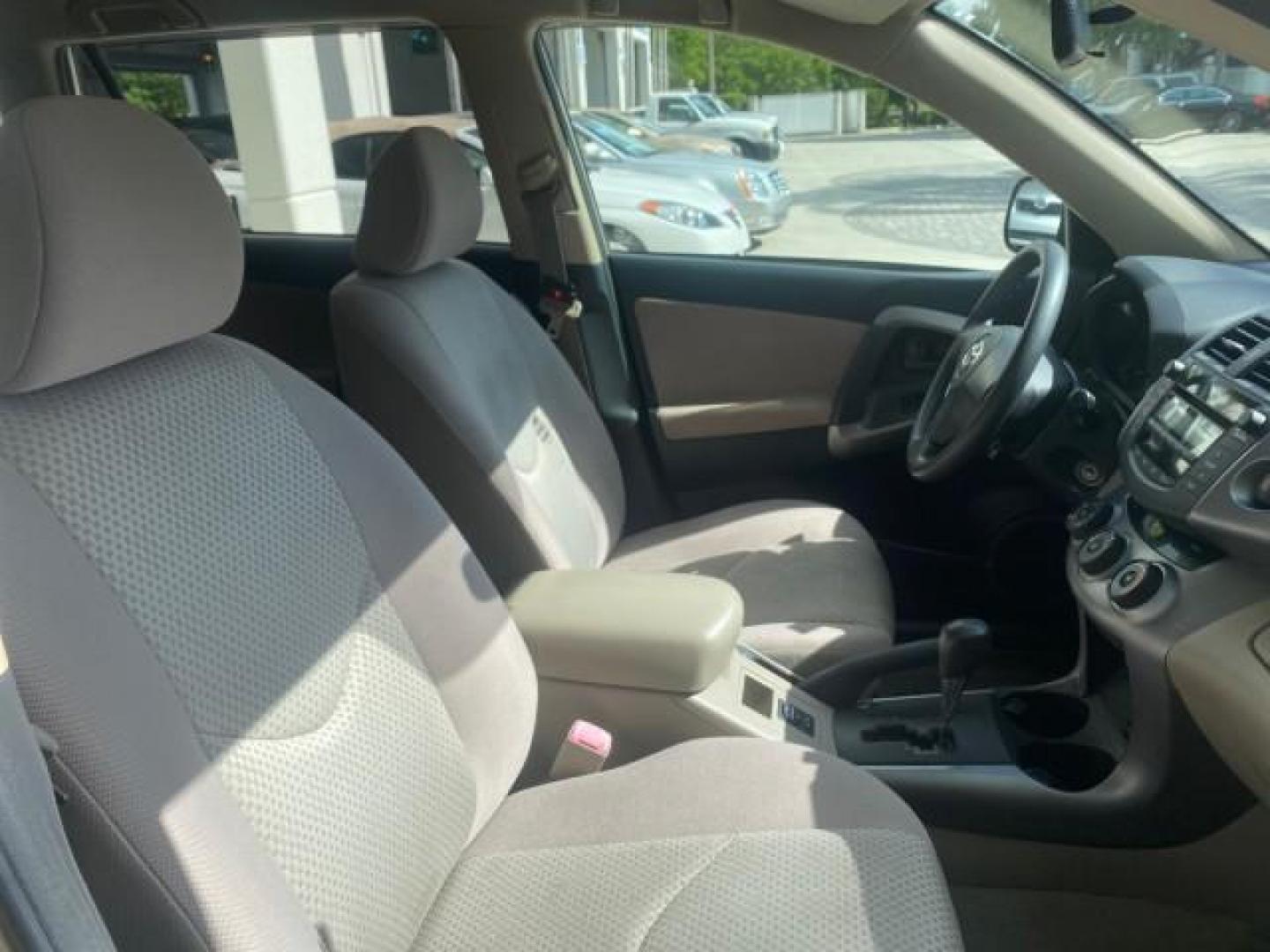 2007 Blizzard Pearl /Taupe Toyota RAV4 1 OWNER FL 24 SERVICES 4X4 (JTMBD33V376) with an 2.4L DOHC SFI 16-Valve VVT-i 4-Cyl Engine engine, Automatic transmission, located at 4701 North Dixie Hwy, Pompano Beach, FL, 33064, (954) 422-2889, 26.240938, -80.123474 - OUR WEBPAGE FLORIDACARS1.COM HAS OVER 100 PHOTOS AND FREE CARFAX LINK 2007 TOYOTA RAV4 VIN: JTMBD33V376029392 J T M B D 3 3 V 3 7 6 0 2 9 3 9 2 4 DOOR WAGON/SPORT UTILITY 2.4L I4 F DOHC 16V GASOLINE ALL WHEEL DRIVE Top Features 4WD/AWD Cloth Seats Basic Features ABS Brakes AM/FM Stereo Air Condition - Photo#99