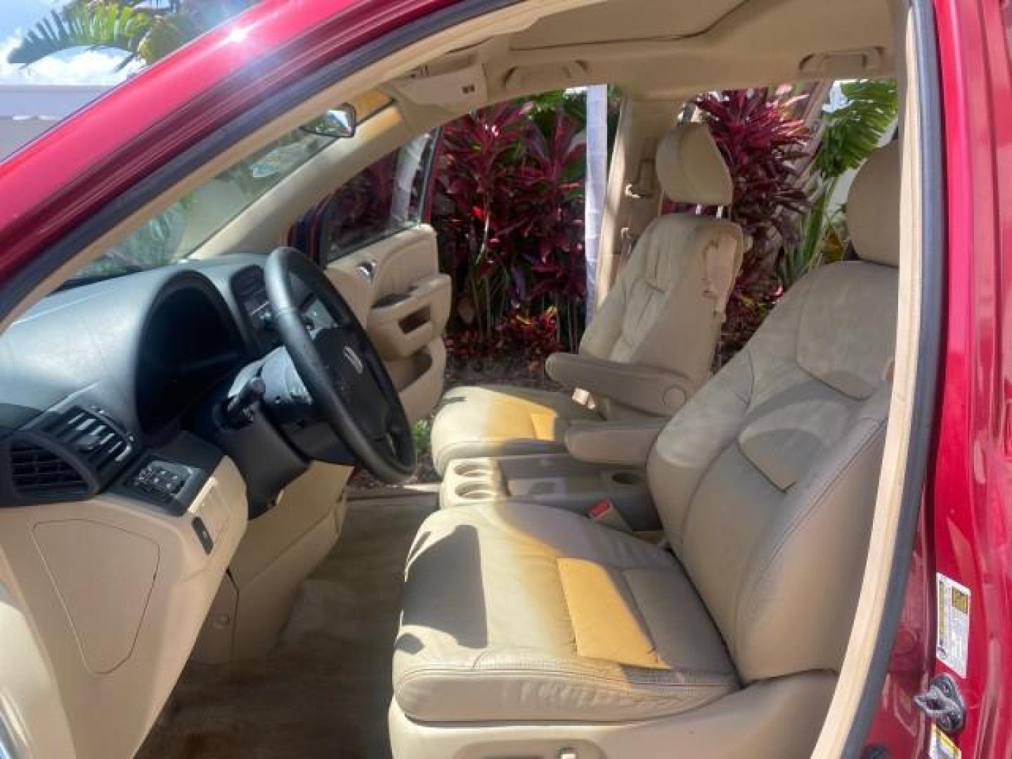 2006 Red Rock Pearl /Ivory Honda Odyssey EX-L 1 OWNER FLORIDA (5FNRL38646B) with an 3.5L SOHC MPFI 24-Valve i-VTEC V6 Engine engine, Automatic transmission, located at 4701 North Dixie Hwy, Pompano Beach, FL, 33064, (954) 422-2889, 26.240938, -80.123474 - OUR WEBPAGE FLORIDACARS1.COM HAS OVER 100 PHOTOS AND FREE CARFAX LINK 2006 HONDA ODYSSEY EX-L VIN: 5FNRL38646B441326 5 F N R L 3 8 6 4 6 B 4 4 1 3 2 6 VAN 3.5L V6 F SOHC 24V GASOLINE FRONT WHEEL DRIVE Top Features Alloy Wheels Fold-Away Third Row Front Seat Heaters Leather Seats Quad Seats Rear Air - Photo#10