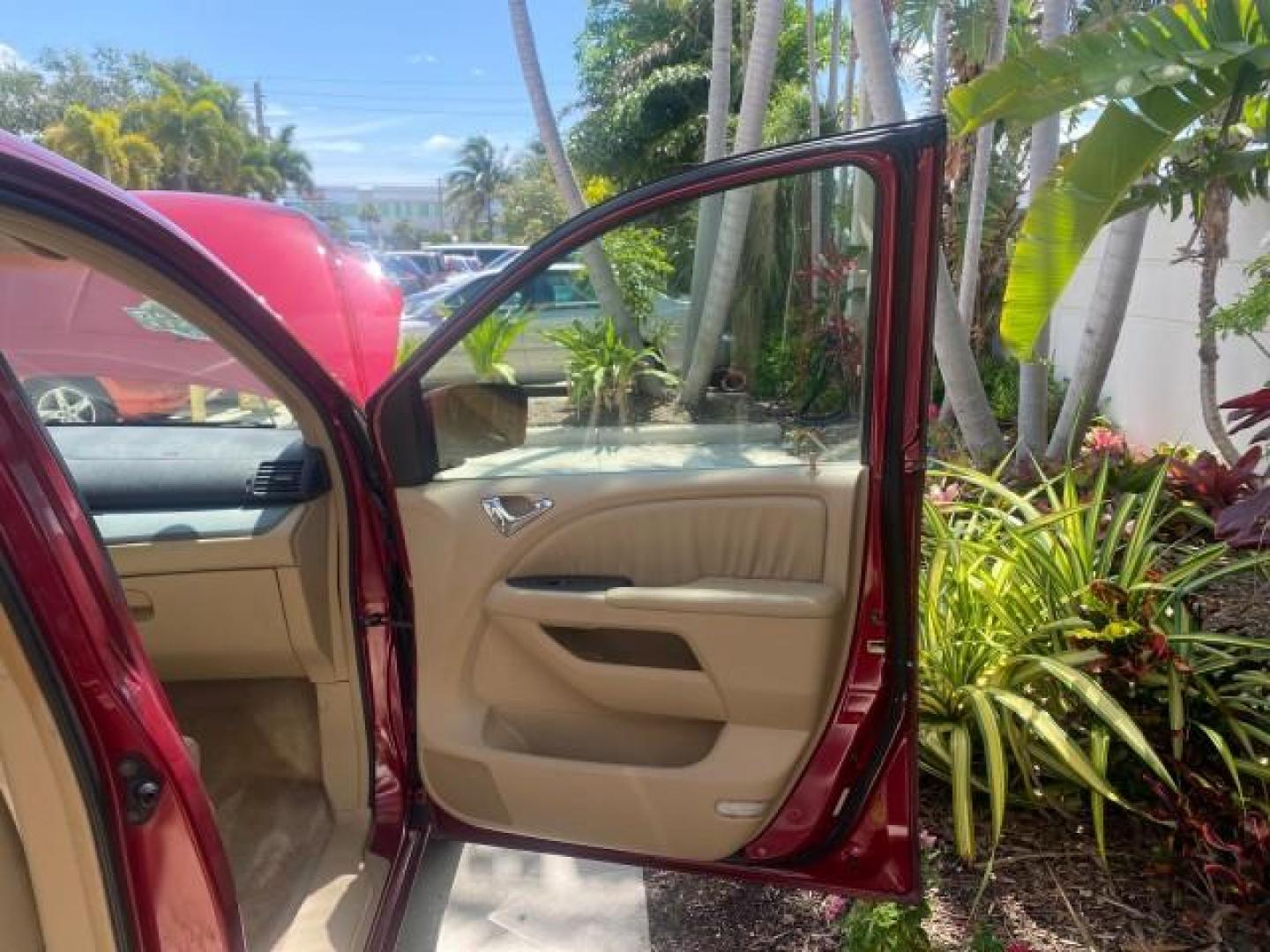 2006 Red Rock Pearl /Ivory Honda Odyssey EX-L 1 OWNER FLORIDA (5FNRL38646B) with an 3.5L SOHC MPFI 24-Valve i-VTEC V6 Engine engine, Automatic transmission, located at 4701 North Dixie Hwy, Pompano Beach, FL, 33064, (954) 422-2889, 26.240938, -80.123474 - OUR WEBPAGE FLORIDACARS1.COM HAS OVER 100 PHOTOS AND FREE CARFAX LINK 2006 HONDA ODYSSEY EX-L VIN: 5FNRL38646B441326 5 F N R L 3 8 6 4 6 B 4 4 1 3 2 6 VAN 3.5L V6 F SOHC 24V GASOLINE FRONT WHEEL DRIVE Top Features Alloy Wheels Fold-Away Third Row Front Seat Heaters Leather Seats Quad Seats Rear Air - Photo#11