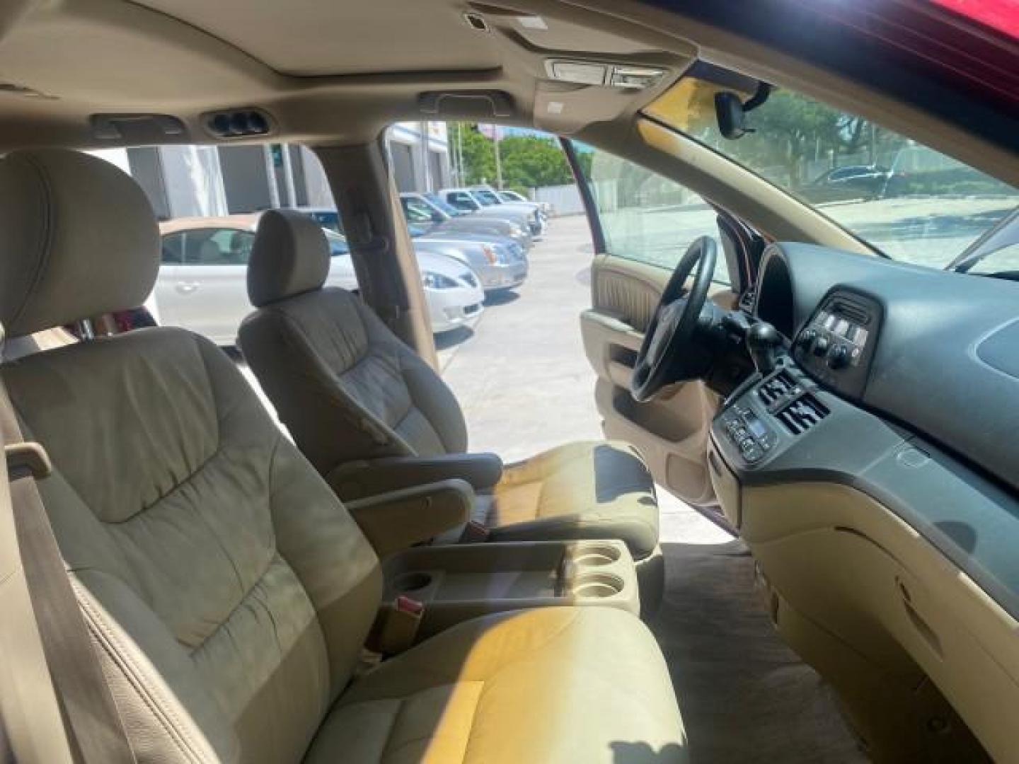 2006 Red Rock Pearl /Ivory Honda Odyssey EX-L 1 OWNER FLORIDA (5FNRL38646B) with an 3.5L SOHC MPFI 24-Valve i-VTEC V6 Engine engine, Automatic transmission, located at 4701 North Dixie Hwy, Pompano Beach, FL, 33064, (954) 422-2889, 26.240938, -80.123474 - OUR WEBPAGE FLORIDACARS1.COM HAS OVER 100 PHOTOS AND FREE CARFAX LINK 2006 HONDA ODYSSEY EX-L VIN: 5FNRL38646B441326 5 F N R L 3 8 6 4 6 B 4 4 1 3 2 6 VAN 3.5L V6 F SOHC 24V GASOLINE FRONT WHEEL DRIVE Top Features Alloy Wheels Fold-Away Third Row Front Seat Heaters Leather Seats Quad Seats Rear Air - Photo#12