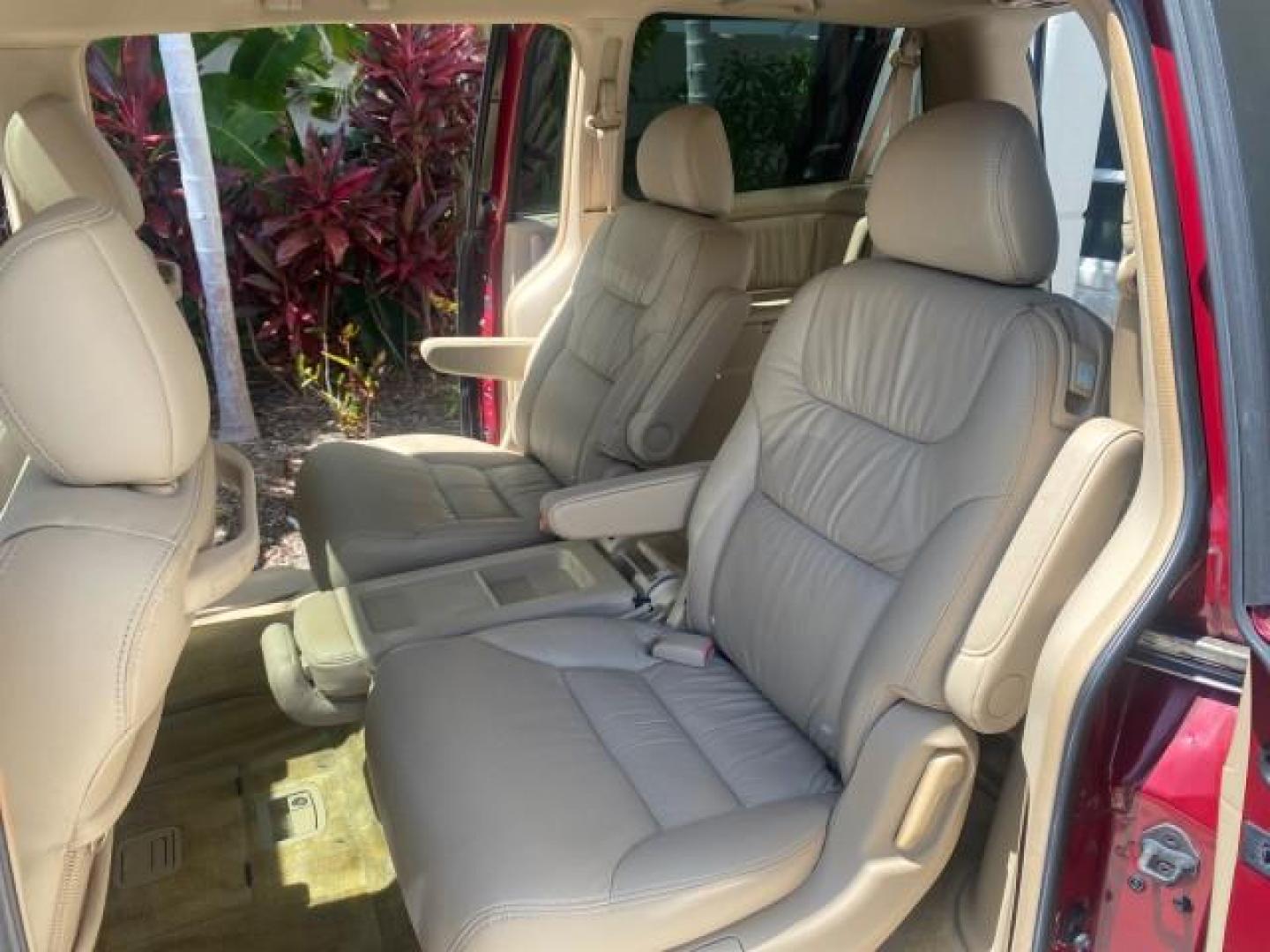 2006 Red Rock Pearl /Ivory Honda Odyssey EX-L 1 OWNER FLORIDA (5FNRL38646B) with an 3.5L SOHC MPFI 24-Valve i-VTEC V6 Engine engine, Automatic transmission, located at 4701 North Dixie Hwy, Pompano Beach, FL, 33064, (954) 422-2889, 26.240938, -80.123474 - OUR WEBPAGE FLORIDACARS1.COM HAS OVER 100 PHOTOS AND FREE CARFAX LINK 2006 HONDA ODYSSEY EX-L VIN: 5FNRL38646B441326 5 F N R L 3 8 6 4 6 B 4 4 1 3 2 6 VAN 3.5L V6 F SOHC 24V GASOLINE FRONT WHEEL DRIVE Top Features Alloy Wheels Fold-Away Third Row Front Seat Heaters Leather Seats Quad Seats Rear Air - Photo#14