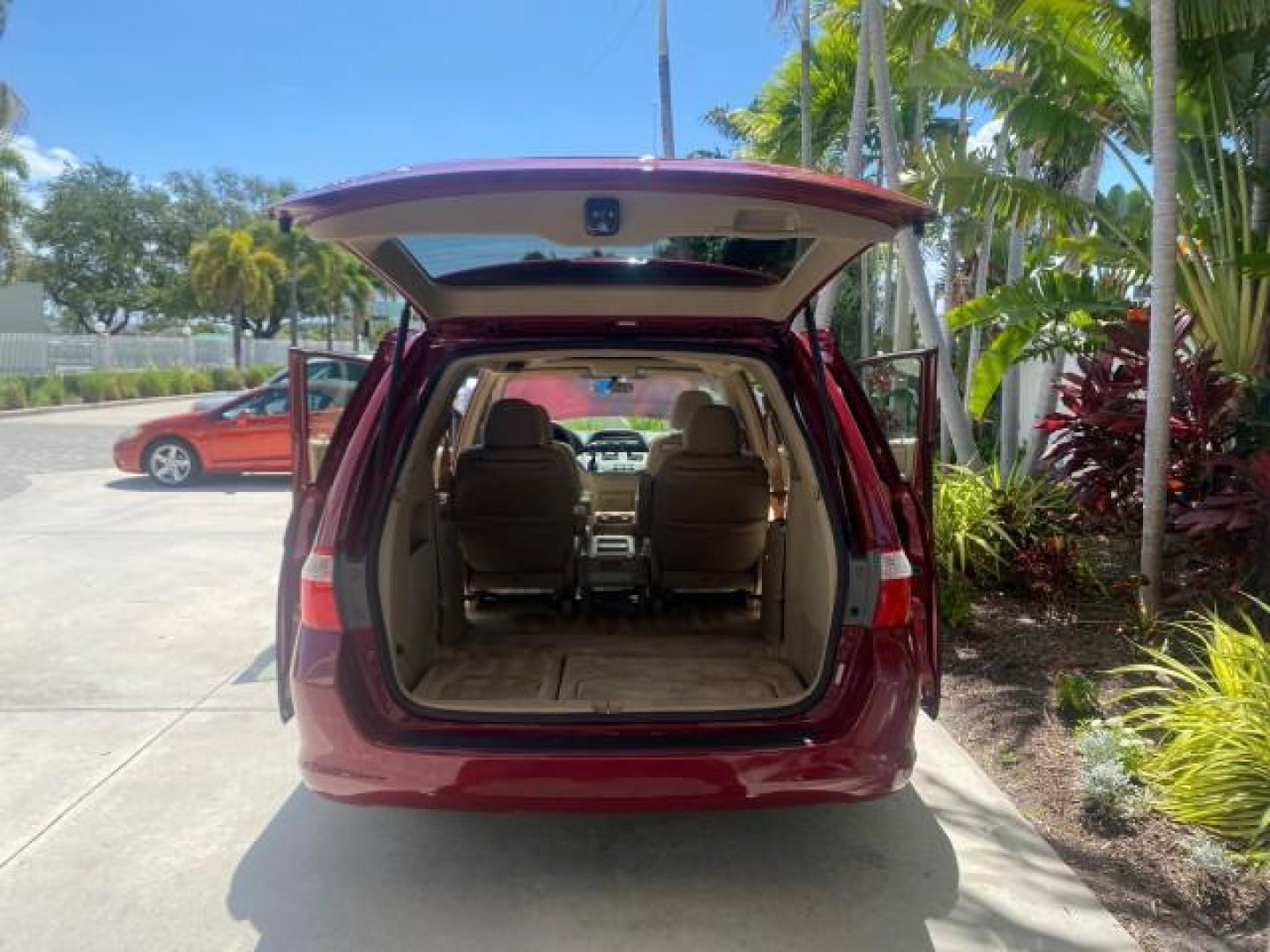 2006 Red Rock Pearl /Ivory Honda Odyssey EX-L 1 OWNER FLORIDA (5FNRL38646B) with an 3.5L SOHC MPFI 24-Valve i-VTEC V6 Engine engine, Automatic transmission, located at 4701 North Dixie Hwy, Pompano Beach, FL, 33064, (954) 422-2889, 26.240938, -80.123474 - OUR WEBPAGE FLORIDACARS1.COM HAS OVER 100 PHOTOS AND FREE CARFAX LINK 2006 HONDA ODYSSEY EX-L VIN: 5FNRL38646B441326 5 F N R L 3 8 6 4 6 B 4 4 1 3 2 6 VAN 3.5L V6 F SOHC 24V GASOLINE FRONT WHEEL DRIVE Top Features Alloy Wheels Fold-Away Third Row Front Seat Heaters Leather Seats Quad Seats Rear Air - Photo#15