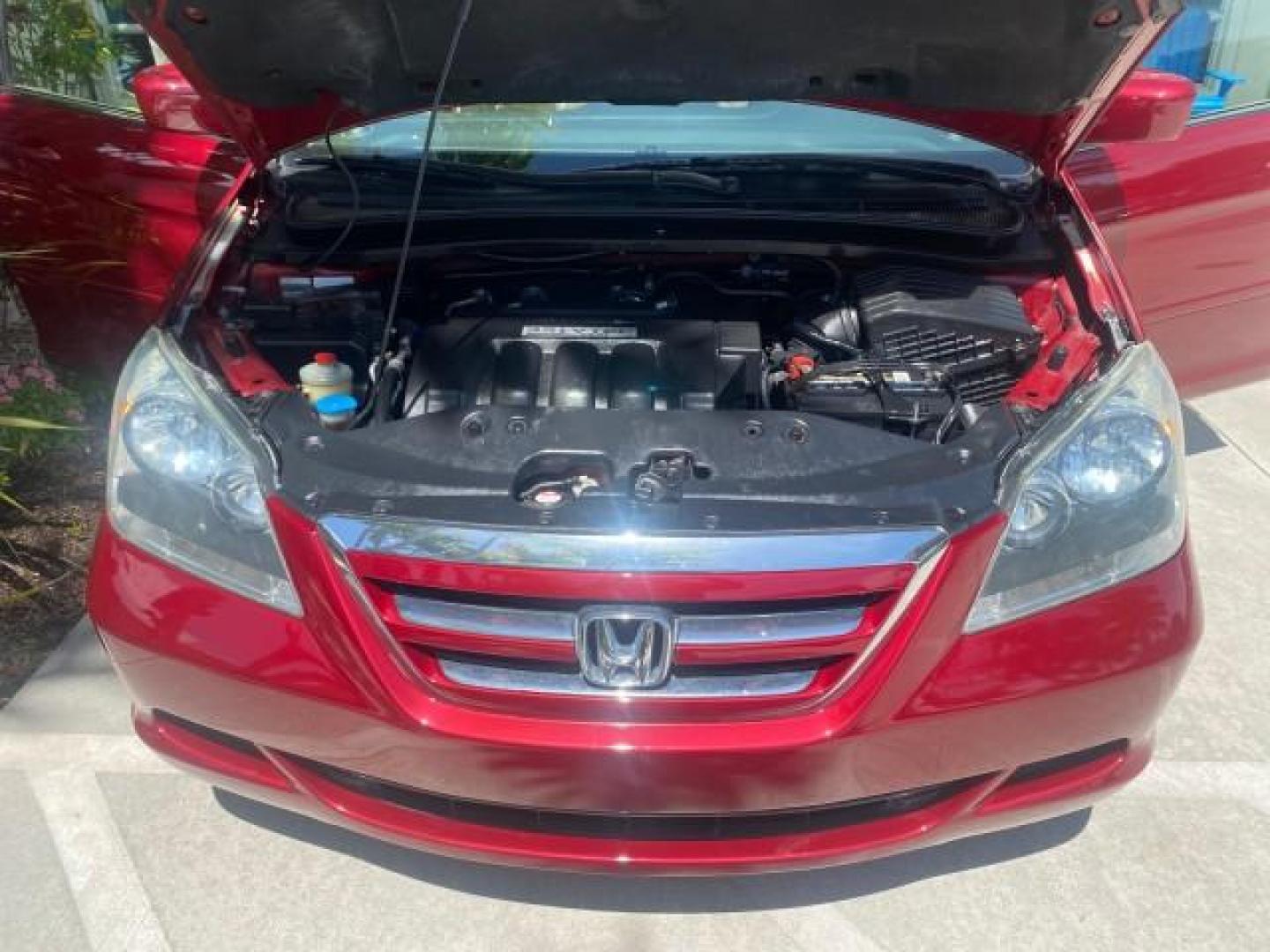 2006 Red Rock Pearl /Ivory Honda Odyssey EX-L 1 OWNER FLORIDA (5FNRL38646B) with an 3.5L SOHC MPFI 24-Valve i-VTEC V6 Engine engine, Automatic transmission, located at 4701 North Dixie Hwy, Pompano Beach, FL, 33064, (954) 422-2889, 26.240938, -80.123474 - OUR WEBPAGE FLORIDACARS1.COM HAS OVER 100 PHOTOS AND FREE CARFAX LINK 2006 HONDA ODYSSEY EX-L VIN: 5FNRL38646B441326 5 F N R L 3 8 6 4 6 B 4 4 1 3 2 6 VAN 3.5L V6 F SOHC 24V GASOLINE FRONT WHEEL DRIVE Top Features Alloy Wheels Fold-Away Third Row Front Seat Heaters Leather Seats Quad Seats Rear Air - Photo#17