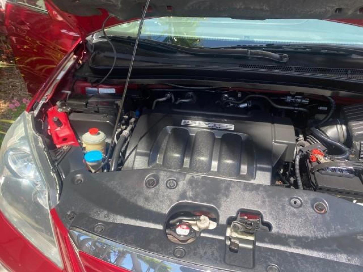 2006 Red Rock Pearl /Ivory Honda Odyssey EX-L 1 OWNER FLORIDA (5FNRL38646B) with an 3.5L SOHC MPFI 24-Valve i-VTEC V6 Engine engine, Automatic transmission, located at 4701 North Dixie Hwy, Pompano Beach, FL, 33064, (954) 422-2889, 26.240938, -80.123474 - OUR WEBPAGE FLORIDACARS1.COM HAS OVER 100 PHOTOS AND FREE CARFAX LINK 2006 HONDA ODYSSEY EX-L VIN: 5FNRL38646B441326 5 F N R L 3 8 6 4 6 B 4 4 1 3 2 6 VAN 3.5L V6 F SOHC 24V GASOLINE FRONT WHEEL DRIVE Top Features Alloy Wheels Fold-Away Third Row Front Seat Heaters Leather Seats Quad Seats Rear Air - Photo#25