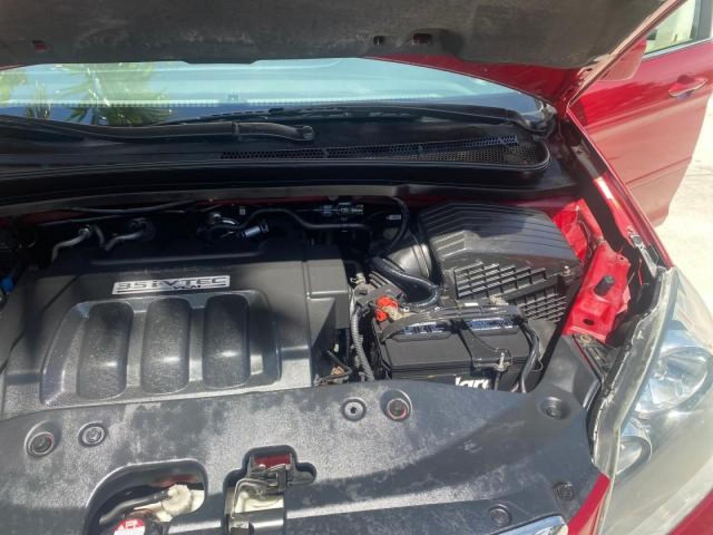 2006 Red Rock Pearl /Ivory Honda Odyssey EX-L 1 OWNER FLORIDA (5FNRL38646B) with an 3.5L SOHC MPFI 24-Valve i-VTEC V6 Engine engine, Automatic transmission, located at 4701 North Dixie Hwy, Pompano Beach, FL, 33064, (954) 422-2889, 26.240938, -80.123474 - OUR WEBPAGE FLORIDACARS1.COM HAS OVER 100 PHOTOS AND FREE CARFAX LINK 2006 HONDA ODYSSEY EX-L VIN: 5FNRL38646B441326 5 F N R L 3 8 6 4 6 B 4 4 1 3 2 6 VAN 3.5L V6 F SOHC 24V GASOLINE FRONT WHEEL DRIVE Top Features Alloy Wheels Fold-Away Third Row Front Seat Heaters Leather Seats Quad Seats Rear Air - Photo#26