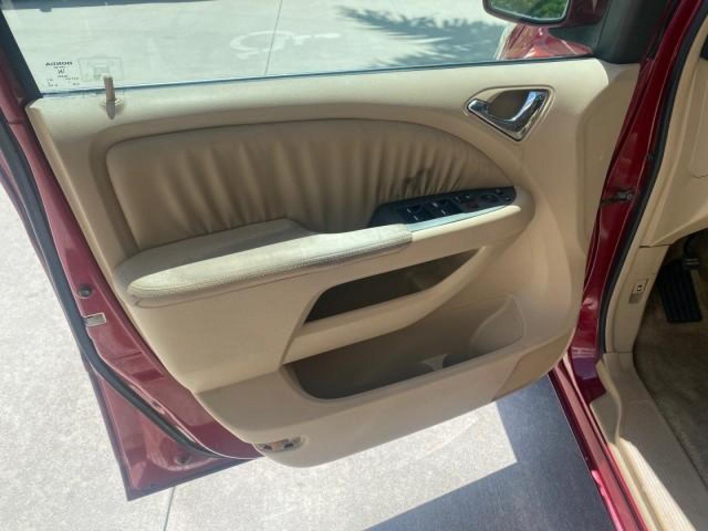 2006 Red Rock Pearl /Ivory Honda Odyssey EX-L 1 OWNER FLORIDA (5FNRL38646B) with an 3.5L SOHC MPFI 24-Valve i-VTEC V6 Engine engine, Automatic transmission, located at 4701 North Dixie Hwy, Pompano Beach, FL, 33064, (954) 422-2889, 26.240938, -80.123474 - OUR WEBPAGE FLORIDACARS1.COM HAS OVER 100 PHOTOS AND FREE CARFAX LINK 2006 HONDA ODYSSEY EX-L VIN: 5FNRL38646B441326 5 F N R L 3 8 6 4 6 B 4 4 1 3 2 6 VAN 3.5L V6 F SOHC 24V GASOLINE FRONT WHEEL DRIVE Top Features Alloy Wheels Fold-Away Third Row Front Seat Heaters Leather Seats Quad Seats Rear Air - Photo#31