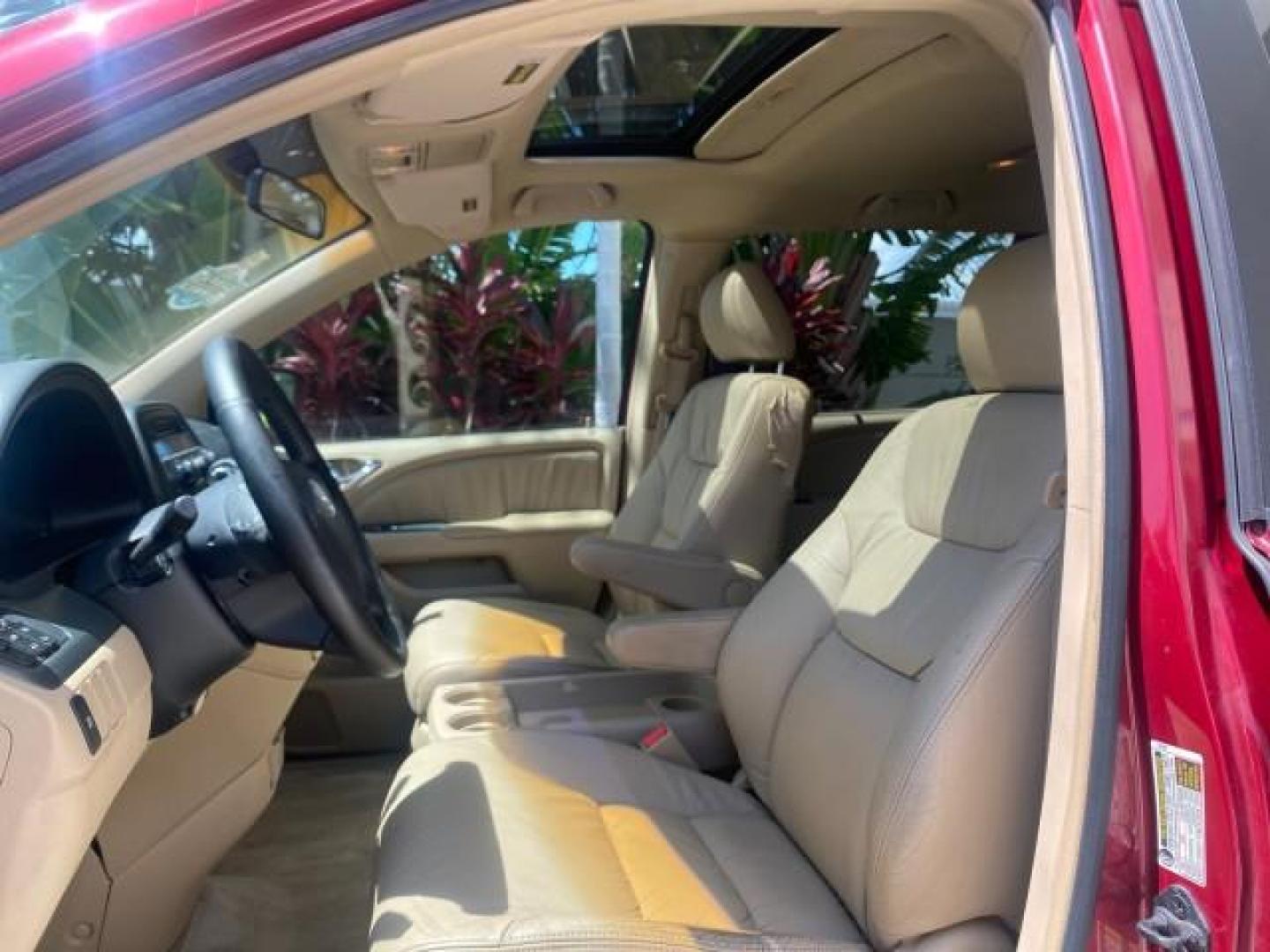 2006 Red Rock Pearl /Ivory Honda Odyssey EX-L 1 OWNER FLORIDA (5FNRL38646B) with an 3.5L SOHC MPFI 24-Valve i-VTEC V6 Engine engine, Automatic transmission, located at 4701 North Dixie Hwy, Pompano Beach, FL, 33064, (954) 422-2889, 26.240938, -80.123474 - OUR WEBPAGE FLORIDACARS1.COM HAS OVER 100 PHOTOS AND FREE CARFAX LINK 2006 HONDA ODYSSEY EX-L VIN: 5FNRL38646B441326 5 F N R L 3 8 6 4 6 B 4 4 1 3 2 6 VAN 3.5L V6 F SOHC 24V GASOLINE FRONT WHEEL DRIVE Top Features Alloy Wheels Fold-Away Third Row Front Seat Heaters Leather Seats Quad Seats Rear Air - Photo#32