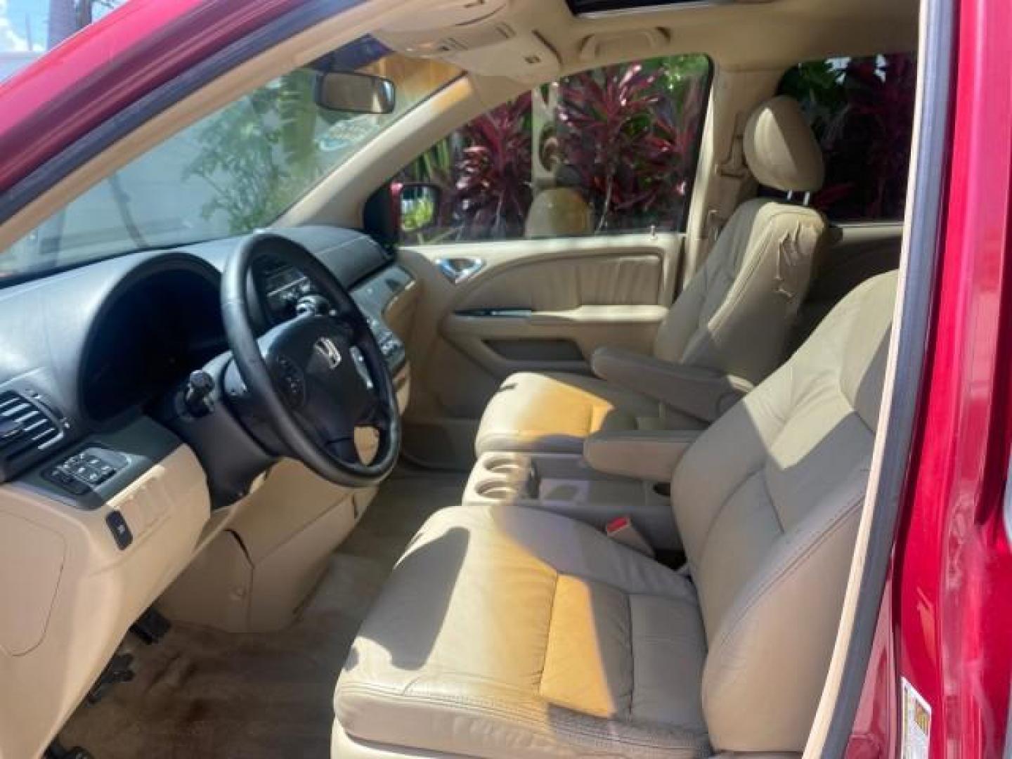 2006 Red Rock Pearl /Ivory Honda Odyssey EX-L 1 OWNER FLORIDA (5FNRL38646B) with an 3.5L SOHC MPFI 24-Valve i-VTEC V6 Engine engine, Automatic transmission, located at 4701 North Dixie Hwy, Pompano Beach, FL, 33064, (954) 422-2889, 26.240938, -80.123474 - OUR WEBPAGE FLORIDACARS1.COM HAS OVER 100 PHOTOS AND FREE CARFAX LINK 2006 HONDA ODYSSEY EX-L VIN: 5FNRL38646B441326 5 F N R L 3 8 6 4 6 B 4 4 1 3 2 6 VAN 3.5L V6 F SOHC 24V GASOLINE FRONT WHEEL DRIVE Top Features Alloy Wheels Fold-Away Third Row Front Seat Heaters Leather Seats Quad Seats Rear Air - Photo#34