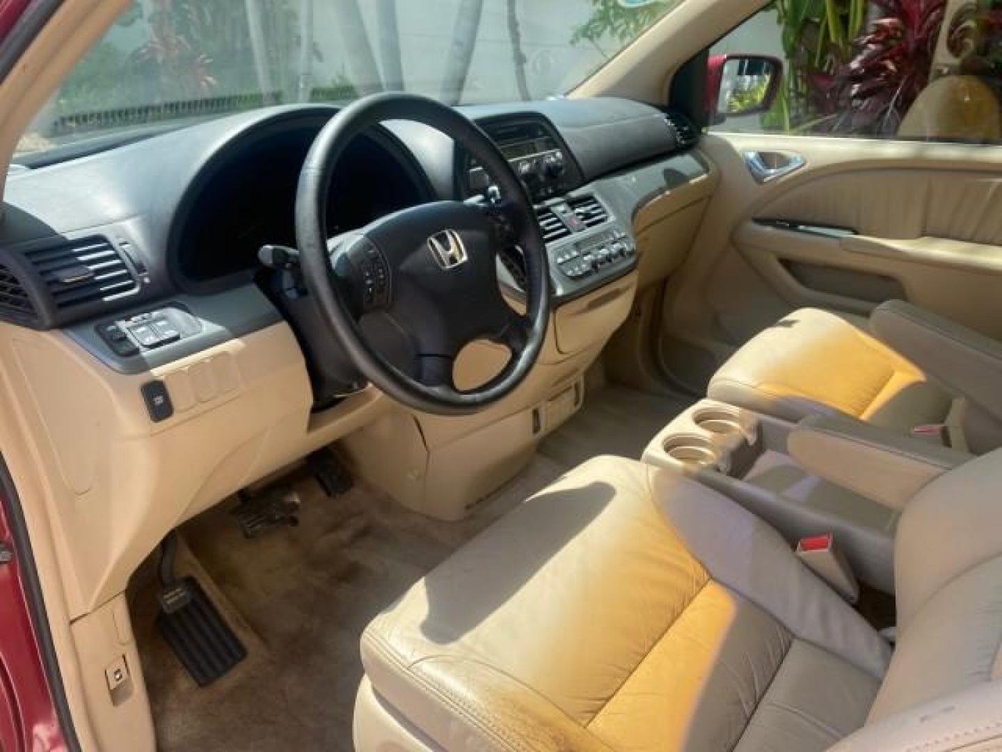 2006 Red Rock Pearl /Ivory Honda Odyssey EX-L 1 OWNER FLORIDA (5FNRL38646B) with an 3.5L SOHC MPFI 24-Valve i-VTEC V6 Engine engine, Automatic transmission, located at 4701 North Dixie Hwy, Pompano Beach, FL, 33064, (954) 422-2889, 26.240938, -80.123474 - OUR WEBPAGE FLORIDACARS1.COM HAS OVER 100 PHOTOS AND FREE CARFAX LINK 2006 HONDA ODYSSEY EX-L VIN: 5FNRL38646B441326 5 F N R L 3 8 6 4 6 B 4 4 1 3 2 6 VAN 3.5L V6 F SOHC 24V GASOLINE FRONT WHEEL DRIVE Top Features Alloy Wheels Fold-Away Third Row Front Seat Heaters Leather Seats Quad Seats Rear Air - Photo#36