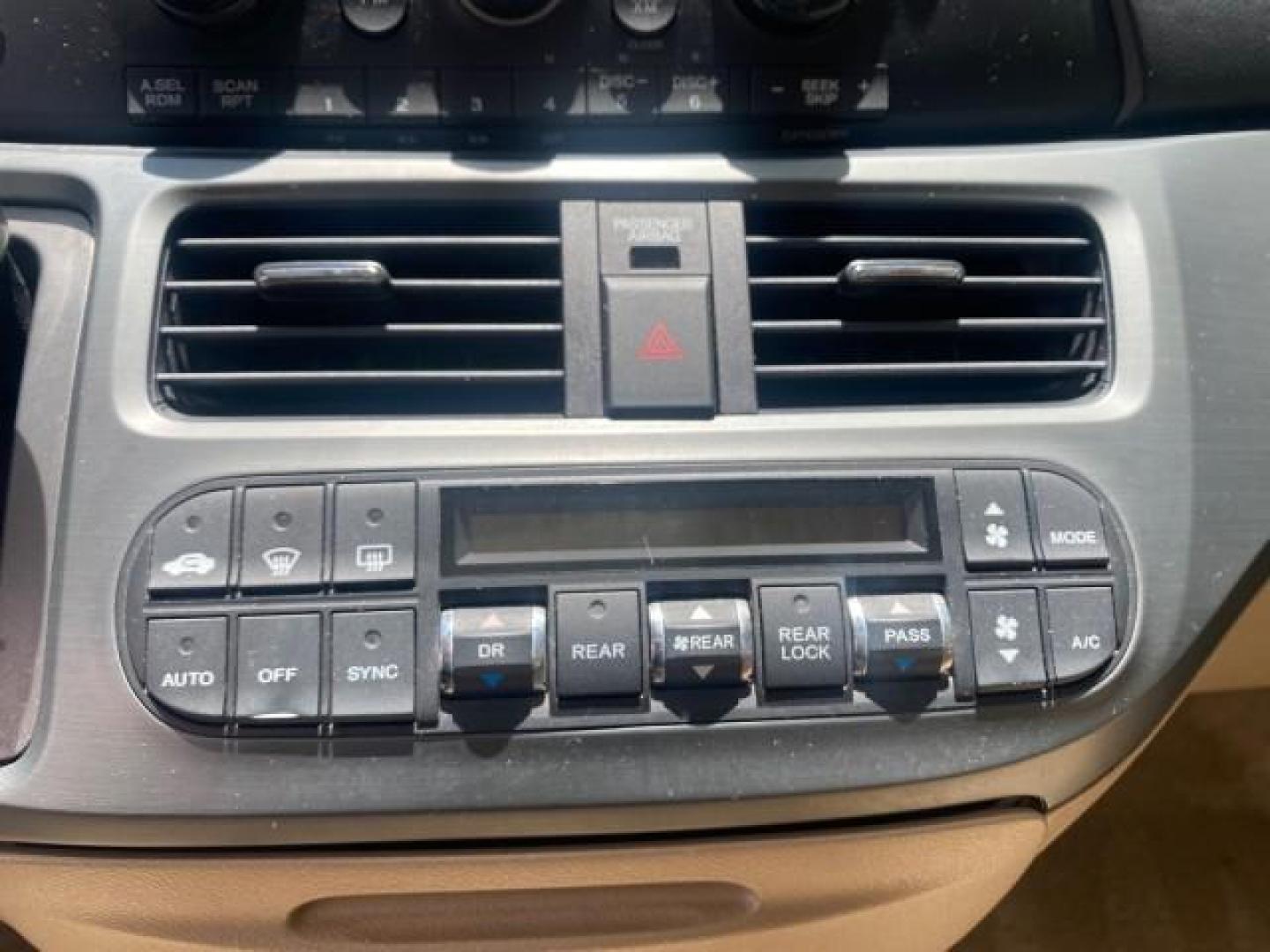 2006 Red Rock Pearl /Ivory Honda Odyssey EX-L 1 OWNER FLORIDA (5FNRL38646B) with an 3.5L SOHC MPFI 24-Valve i-VTEC V6 Engine engine, Automatic transmission, located at 4701 North Dixie Hwy, Pompano Beach, FL, 33064, (954) 422-2889, 26.240938, -80.123474 - OUR WEBPAGE FLORIDACARS1.COM HAS OVER 100 PHOTOS AND FREE CARFAX LINK 2006 HONDA ODYSSEY EX-L VIN: 5FNRL38646B441326 5 F N R L 3 8 6 4 6 B 4 4 1 3 2 6 VAN 3.5L V6 F SOHC 24V GASOLINE FRONT WHEEL DRIVE Top Features Alloy Wheels Fold-Away Third Row Front Seat Heaters Leather Seats Quad Seats Rear Air - Photo#48