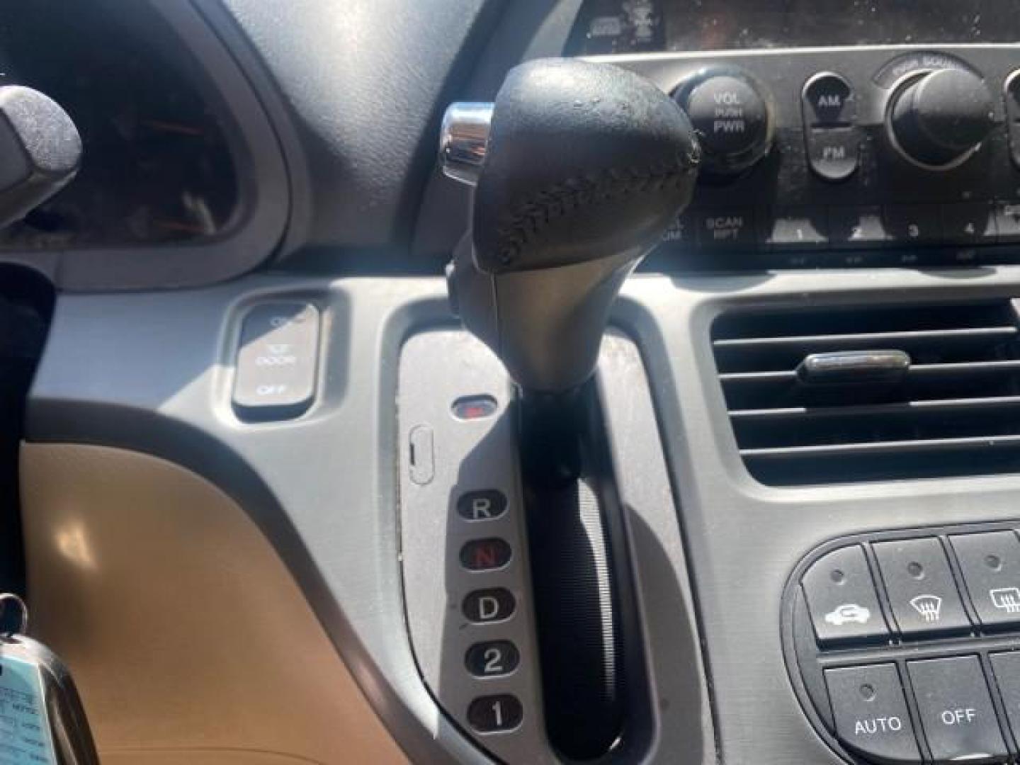 2006 Red Rock Pearl /Ivory Honda Odyssey EX-L 1 OWNER FLORIDA (5FNRL38646B) with an 3.5L SOHC MPFI 24-Valve i-VTEC V6 Engine engine, Automatic transmission, located at 4701 North Dixie Hwy, Pompano Beach, FL, 33064, (954) 422-2889, 26.240938, -80.123474 - OUR WEBPAGE FLORIDACARS1.COM HAS OVER 100 PHOTOS AND FREE CARFAX LINK 2006 HONDA ODYSSEY EX-L VIN: 5FNRL38646B441326 5 F N R L 3 8 6 4 6 B 4 4 1 3 2 6 VAN 3.5L V6 F SOHC 24V GASOLINE FRONT WHEEL DRIVE Top Features Alloy Wheels Fold-Away Third Row Front Seat Heaters Leather Seats Quad Seats Rear Air - Photo#49