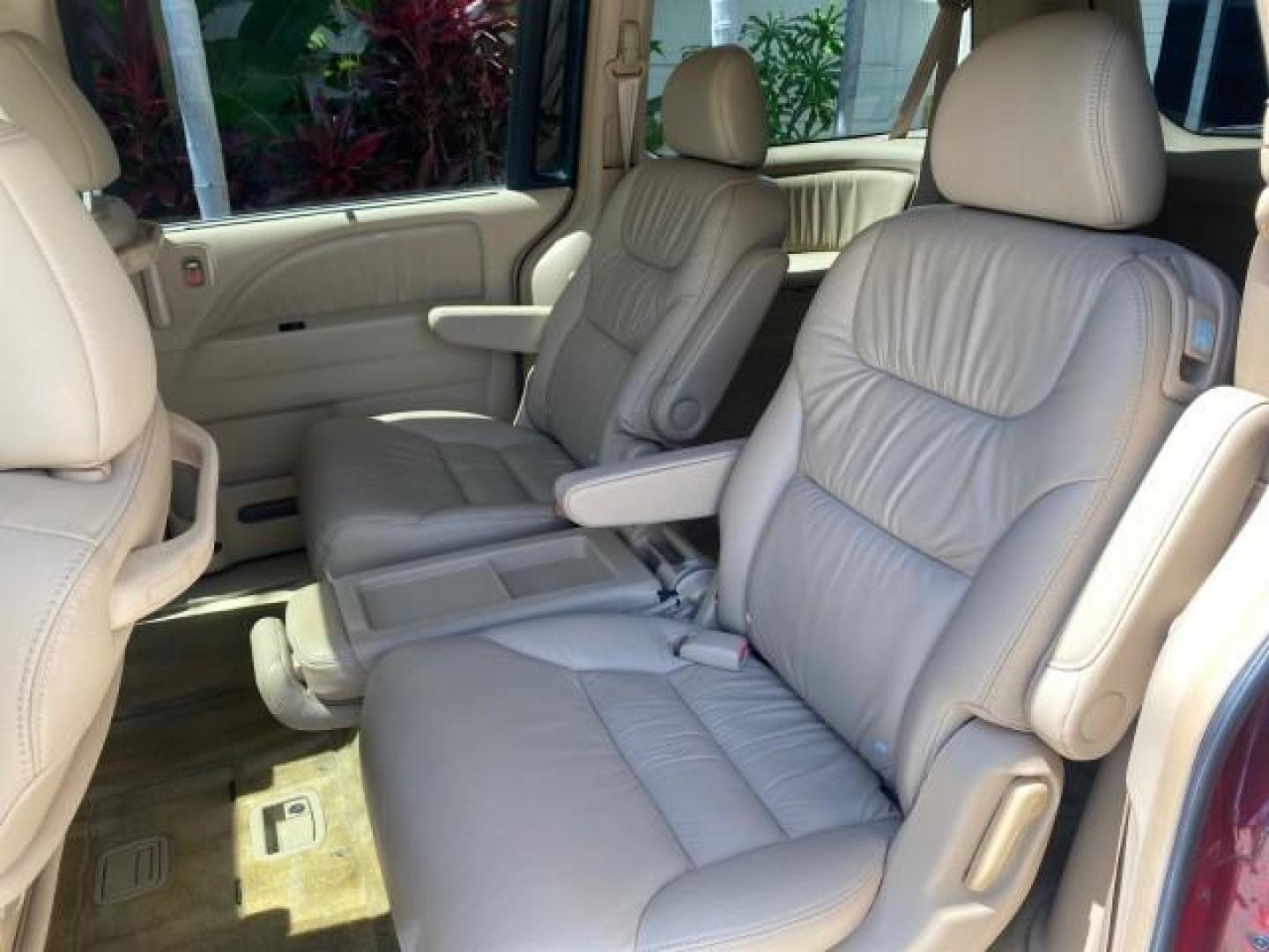 2006 Red Rock Pearl /Ivory Honda Odyssey EX-L 1 OWNER FLORIDA (5FNRL38646B) with an 3.5L SOHC MPFI 24-Valve i-VTEC V6 Engine engine, Automatic transmission, located at 4701 North Dixie Hwy, Pompano Beach, FL, 33064, (954) 422-2889, 26.240938, -80.123474 - OUR WEBPAGE FLORIDACARS1.COM HAS OVER 100 PHOTOS AND FREE CARFAX LINK 2006 HONDA ODYSSEY EX-L VIN: 5FNRL38646B441326 5 F N R L 3 8 6 4 6 B 4 4 1 3 2 6 VAN 3.5L V6 F SOHC 24V GASOLINE FRONT WHEEL DRIVE Top Features Alloy Wheels Fold-Away Third Row Front Seat Heaters Leather Seats Quad Seats Rear Air - Photo#66