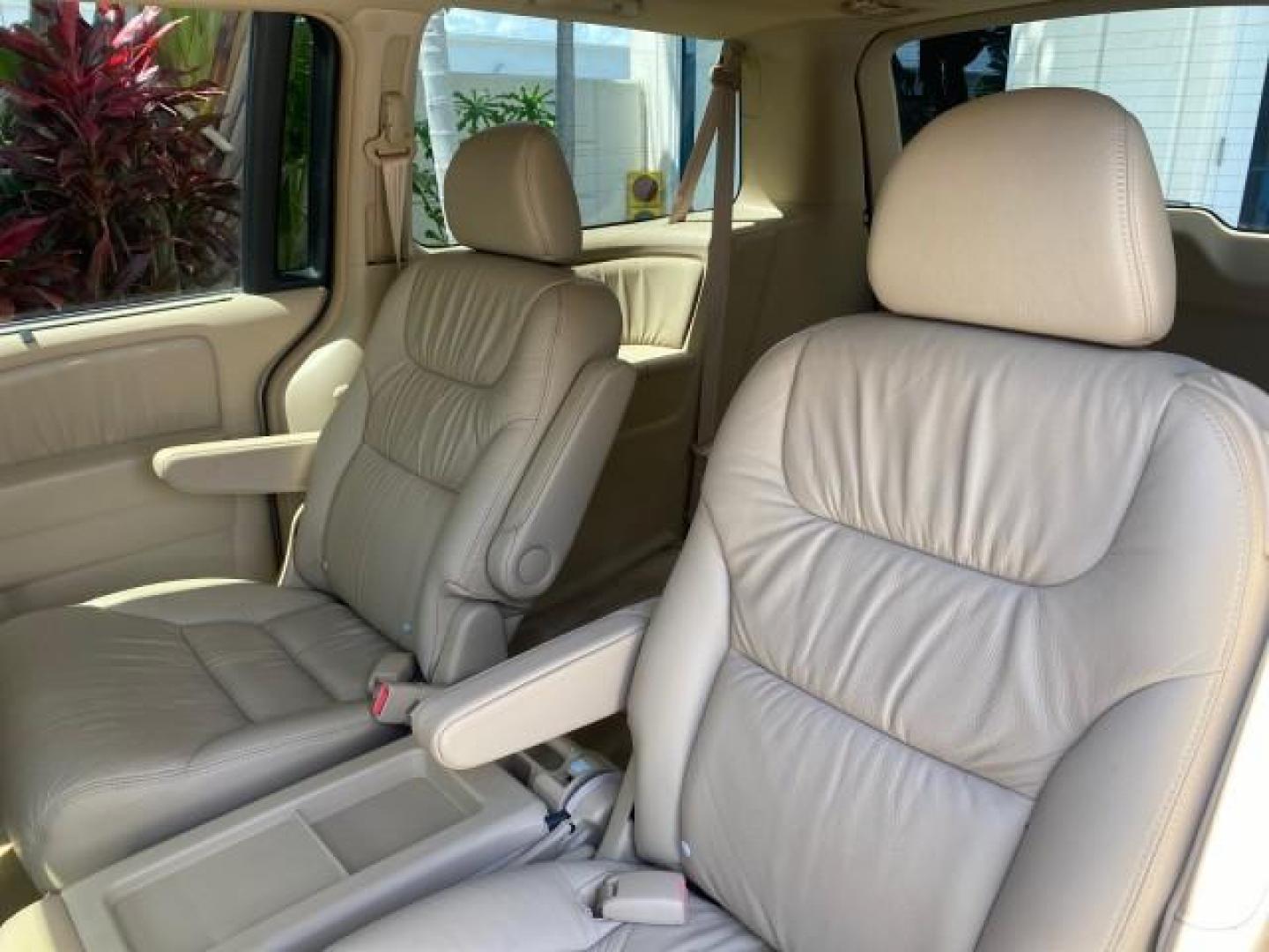 2006 Red Rock Pearl /Ivory Honda Odyssey EX-L 1 OWNER FLORIDA (5FNRL38646B) with an 3.5L SOHC MPFI 24-Valve i-VTEC V6 Engine engine, Automatic transmission, located at 4701 North Dixie Hwy, Pompano Beach, FL, 33064, (954) 422-2889, 26.240938, -80.123474 - OUR WEBPAGE FLORIDACARS1.COM HAS OVER 100 PHOTOS AND FREE CARFAX LINK 2006 HONDA ODYSSEY EX-L VIN: 5FNRL38646B441326 5 F N R L 3 8 6 4 6 B 4 4 1 3 2 6 VAN 3.5L V6 F SOHC 24V GASOLINE FRONT WHEEL DRIVE Top Features Alloy Wheels Fold-Away Third Row Front Seat Heaters Leather Seats Quad Seats Rear Air - Photo#67