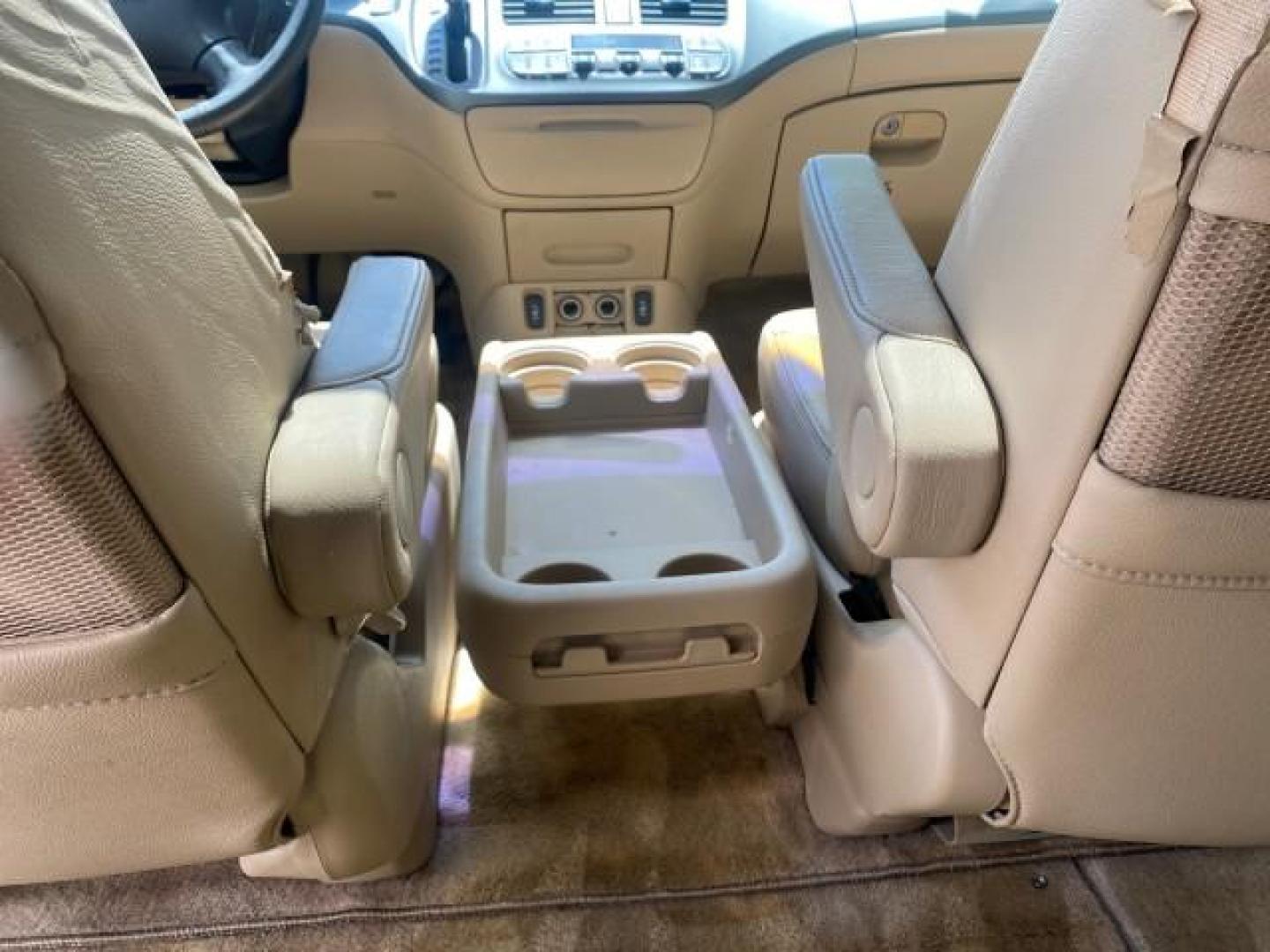 2006 Red Rock Pearl /Ivory Honda Odyssey EX-L 1 OWNER FLORIDA (5FNRL38646B) with an 3.5L SOHC MPFI 24-Valve i-VTEC V6 Engine engine, Automatic transmission, located at 4701 North Dixie Hwy, Pompano Beach, FL, 33064, (954) 422-2889, 26.240938, -80.123474 - OUR WEBPAGE FLORIDACARS1.COM HAS OVER 100 PHOTOS AND FREE CARFAX LINK 2006 HONDA ODYSSEY EX-L VIN: 5FNRL38646B441326 5 F N R L 3 8 6 4 6 B 4 4 1 3 2 6 VAN 3.5L V6 F SOHC 24V GASOLINE FRONT WHEEL DRIVE Top Features Alloy Wheels Fold-Away Third Row Front Seat Heaters Leather Seats Quad Seats Rear Air - Photo#70