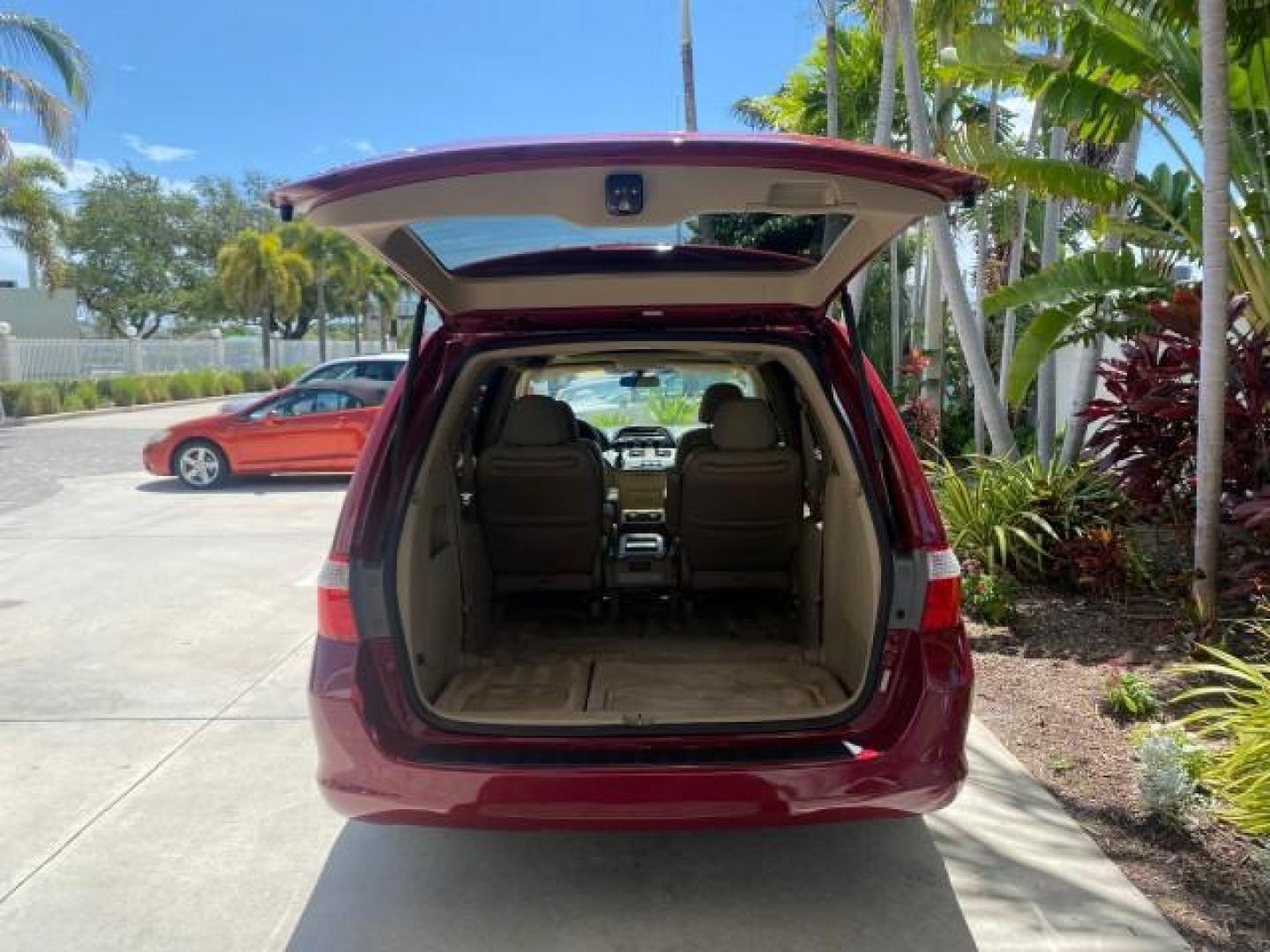 2006 Red Rock Pearl /Ivory Honda Odyssey EX-L 1 OWNER FLORIDA (5FNRL38646B) with an 3.5L SOHC MPFI 24-Valve i-VTEC V6 Engine engine, Automatic transmission, located at 4701 North Dixie Hwy, Pompano Beach, FL, 33064, (954) 422-2889, 26.240938, -80.123474 - OUR WEBPAGE FLORIDACARS1.COM HAS OVER 100 PHOTOS AND FREE CARFAX LINK 2006 HONDA ODYSSEY EX-L VIN: 5FNRL38646B441326 5 F N R L 3 8 6 4 6 B 4 4 1 3 2 6 VAN 3.5L V6 F SOHC 24V GASOLINE FRONT WHEEL DRIVE Top Features Alloy Wheels Fold-Away Third Row Front Seat Heaters Leather Seats Quad Seats Rear Air - Photo#80