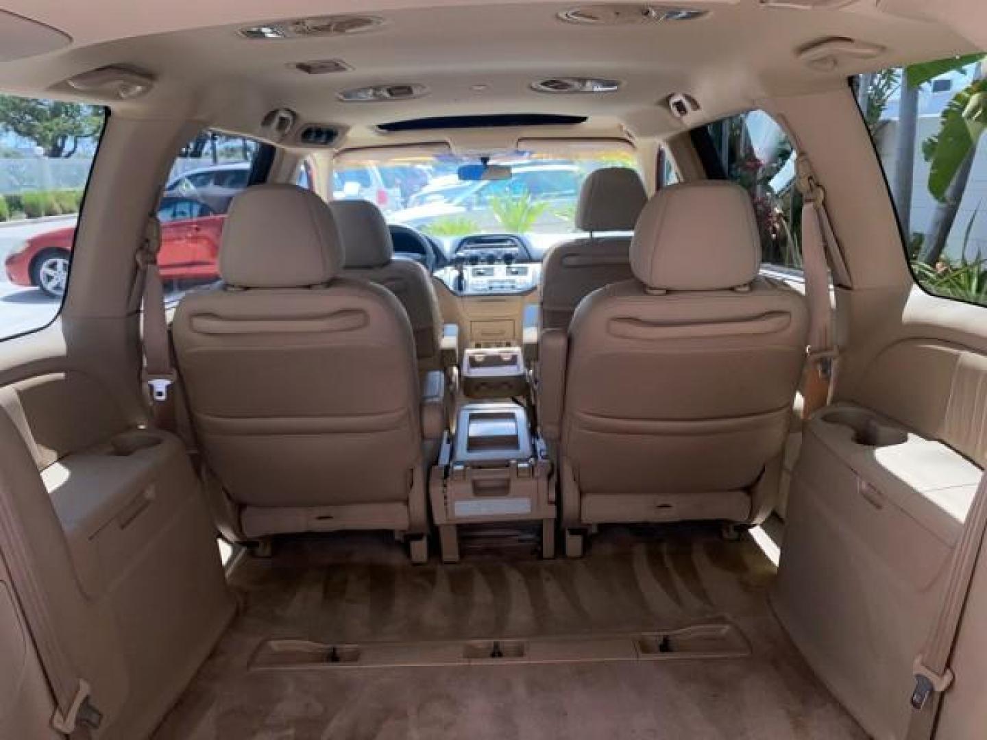 2006 Red Rock Pearl /Ivory Honda Odyssey EX-L 1 OWNER FLORIDA (5FNRL38646B) with an 3.5L SOHC MPFI 24-Valve i-VTEC V6 Engine engine, Automatic transmission, located at 4701 North Dixie Hwy, Pompano Beach, FL, 33064, (954) 422-2889, 26.240938, -80.123474 - OUR WEBPAGE FLORIDACARS1.COM HAS OVER 100 PHOTOS AND FREE CARFAX LINK 2006 HONDA ODYSSEY EX-L VIN: 5FNRL38646B441326 5 F N R L 3 8 6 4 6 B 4 4 1 3 2 6 VAN 3.5L V6 F SOHC 24V GASOLINE FRONT WHEEL DRIVE Top Features Alloy Wheels Fold-Away Third Row Front Seat Heaters Leather Seats Quad Seats Rear Air - Photo#83