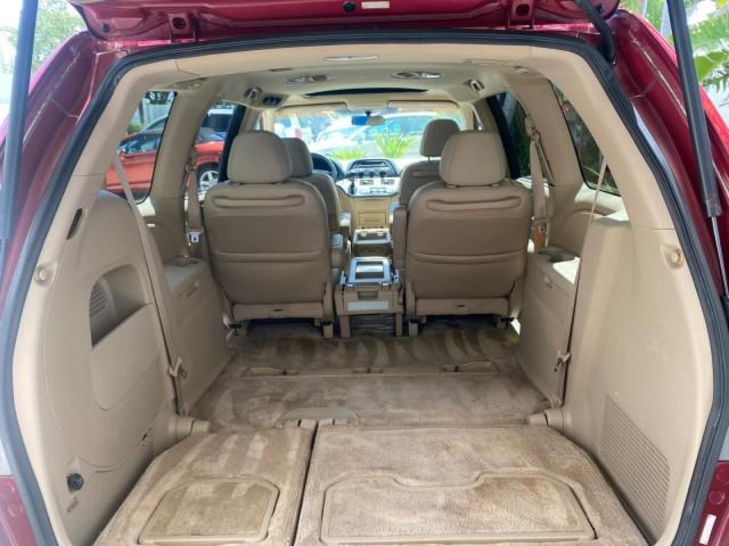 2006 Red Rock Pearl /Ivory Honda Odyssey EX-L 1 OWNER FLORIDA (5FNRL38646B) with an 3.5L SOHC MPFI 24-Valve i-VTEC V6 Engine engine, Automatic transmission, located at 4701 North Dixie Hwy, Pompano Beach, FL, 33064, (954) 422-2889, 26.240938, -80.123474 - OUR WEBPAGE FLORIDACARS1.COM HAS OVER 100 PHOTOS AND FREE CARFAX LINK 2006 HONDA ODYSSEY EX-L VIN: 5FNRL38646B441326 5 F N R L 3 8 6 4 6 B 4 4 1 3 2 6 VAN 3.5L V6 F SOHC 24V GASOLINE FRONT WHEEL DRIVE Top Features Alloy Wheels Fold-Away Third Row Front Seat Heaters Leather Seats Quad Seats Rear Air - Photo#84