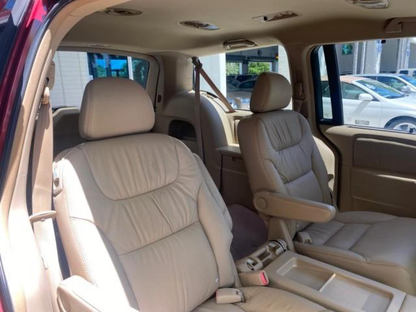 2006 Red Rock Pearl /Ivory Honda Odyssey EX-L 1 OWNER FLORIDA (5FNRL38646B) with an 3.5L SOHC MPFI 24-Valve i-VTEC V6 Engine engine, Automatic transmission, located at 4701 North Dixie Hwy, Pompano Beach, FL, 33064, (954) 422-2889, 26.240938, -80.123474 - OUR WEBPAGE FLORIDACARS1.COM HAS OVER 100 PHOTOS AND FREE CARFAX LINK 2006 HONDA ODYSSEY EX-L VIN: 5FNRL38646B441326 5 F N R L 3 8 6 4 6 B 4 4 1 3 2 6 VAN 3.5L V6 F SOHC 24V GASOLINE FRONT WHEEL DRIVE Top Features Alloy Wheels Fold-Away Third Row Front Seat Heaters Leather Seats Quad Seats Rear Air - Photo#90