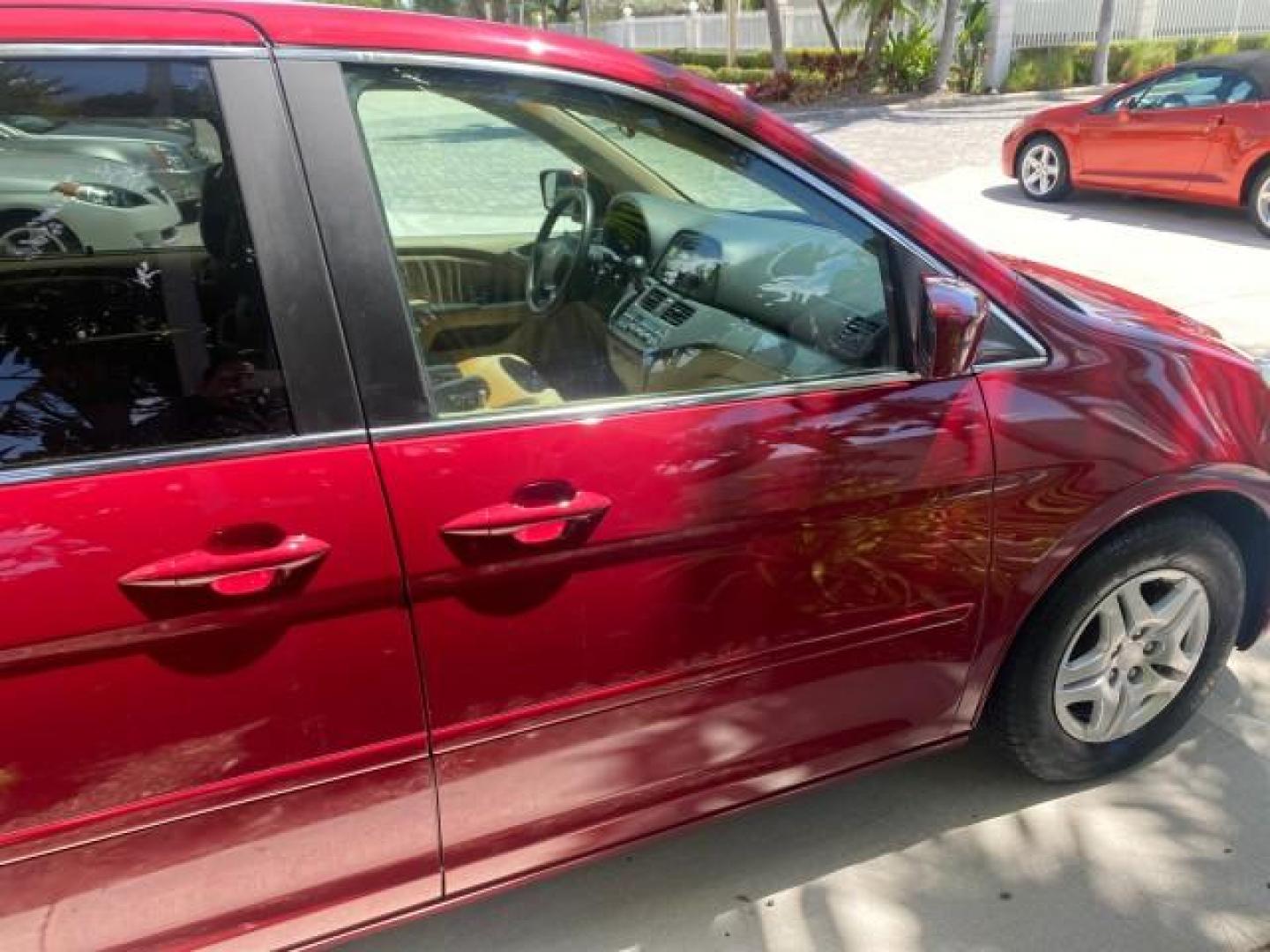 2006 Red Rock Pearl /Ivory Honda Odyssey EX-L 1 OWNER FLORIDA (5FNRL38646B) with an 3.5L SOHC MPFI 24-Valve i-VTEC V6 Engine engine, Automatic transmission, located at 4701 North Dixie Hwy, Pompano Beach, FL, 33064, (954) 422-2889, 26.240938, -80.123474 - OUR WEBPAGE FLORIDACARS1.COM HAS OVER 100 PHOTOS AND FREE CARFAX LINK 2006 HONDA ODYSSEY EX-L VIN: 5FNRL38646B441326 5 F N R L 3 8 6 4 6 B 4 4 1 3 2 6 VAN 3.5L V6 F SOHC 24V GASOLINE FRONT WHEEL DRIVE Top Features Alloy Wheels Fold-Away Third Row Front Seat Heaters Leather Seats Quad Seats Rear Air - Photo#93