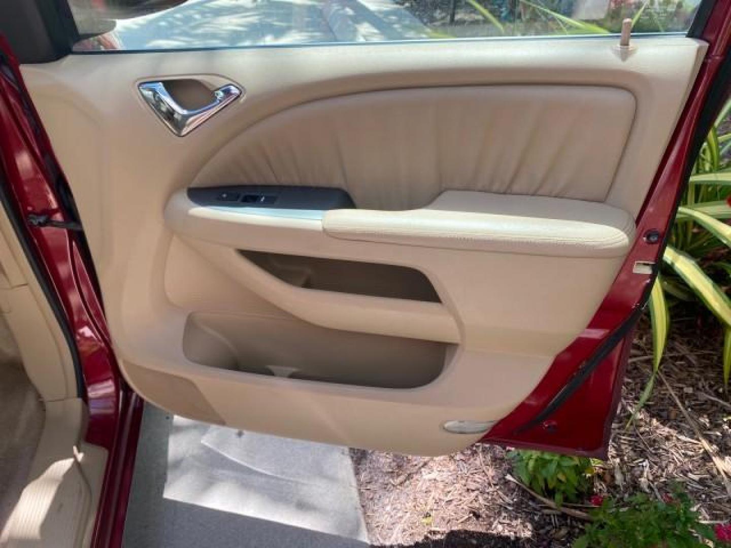 2006 Red Rock Pearl /Ivory Honda Odyssey EX-L 1 OWNER FLORIDA (5FNRL38646B) with an 3.5L SOHC MPFI 24-Valve i-VTEC V6 Engine engine, Automatic transmission, located at 4701 North Dixie Hwy, Pompano Beach, FL, 33064, (954) 422-2889, 26.240938, -80.123474 - OUR WEBPAGE FLORIDACARS1.COM HAS OVER 100 PHOTOS AND FREE CARFAX LINK 2006 HONDA ODYSSEY EX-L VIN: 5FNRL38646B441326 5 F N R L 3 8 6 4 6 B 4 4 1 3 2 6 VAN 3.5L V6 F SOHC 24V GASOLINE FRONT WHEEL DRIVE Top Features Alloy Wheels Fold-Away Third Row Front Seat Heaters Leather Seats Quad Seats Rear Air - Photo#95