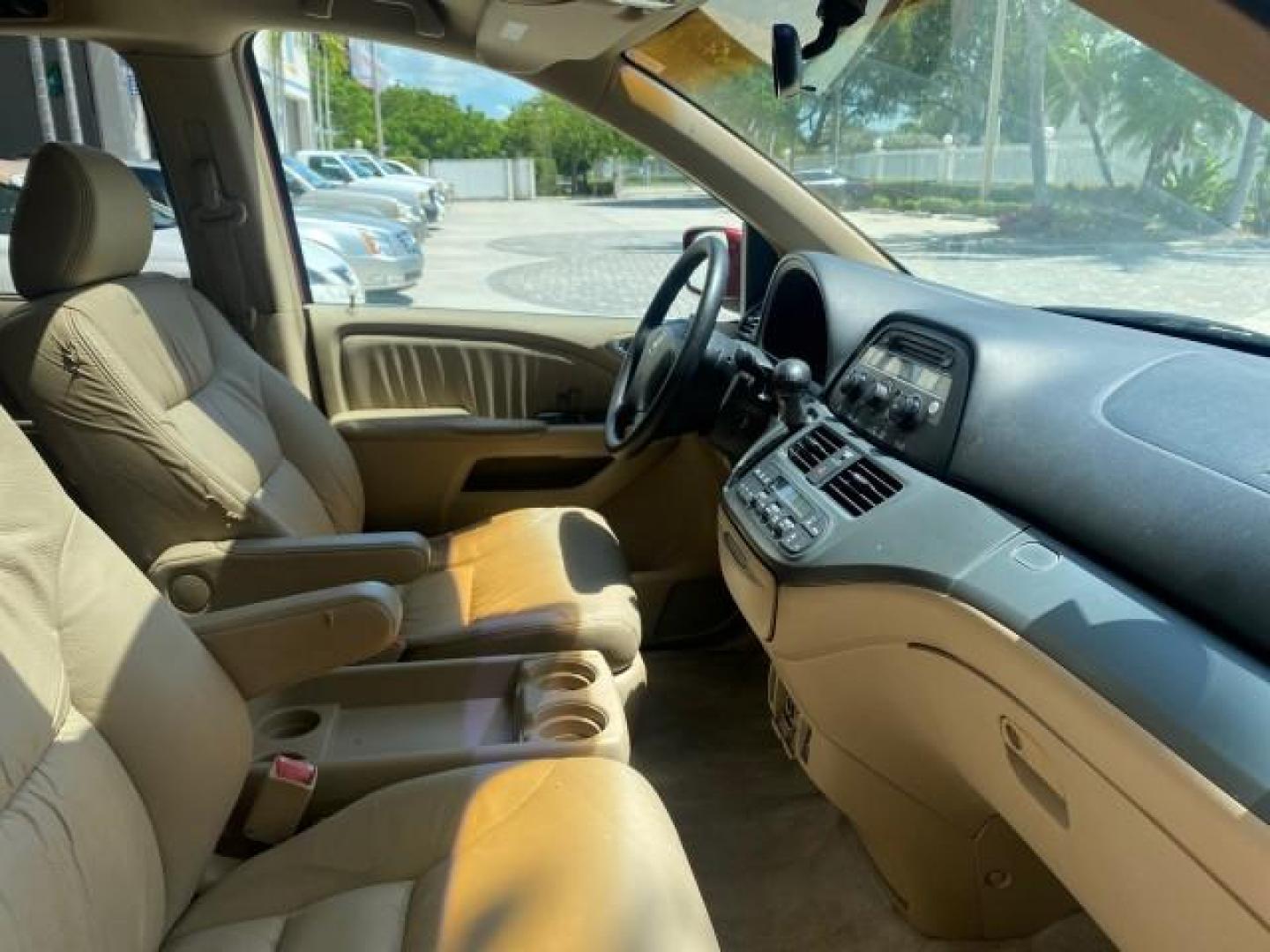 2006 Red Rock Pearl /Ivory Honda Odyssey EX-L 1 OWNER FLORIDA (5FNRL38646B) with an 3.5L SOHC MPFI 24-Valve i-VTEC V6 Engine engine, Automatic transmission, located at 4701 North Dixie Hwy, Pompano Beach, FL, 33064, (954) 422-2889, 26.240938, -80.123474 - OUR WEBPAGE FLORIDACARS1.COM HAS OVER 100 PHOTOS AND FREE CARFAX LINK 2006 HONDA ODYSSEY EX-L VIN: 5FNRL38646B441326 5 F N R L 3 8 6 4 6 B 4 4 1 3 2 6 VAN 3.5L V6 F SOHC 24V GASOLINE FRONT WHEEL DRIVE Top Features Alloy Wheels Fold-Away Third Row Front Seat Heaters Leather Seats Quad Seats Rear Air - Photo#99