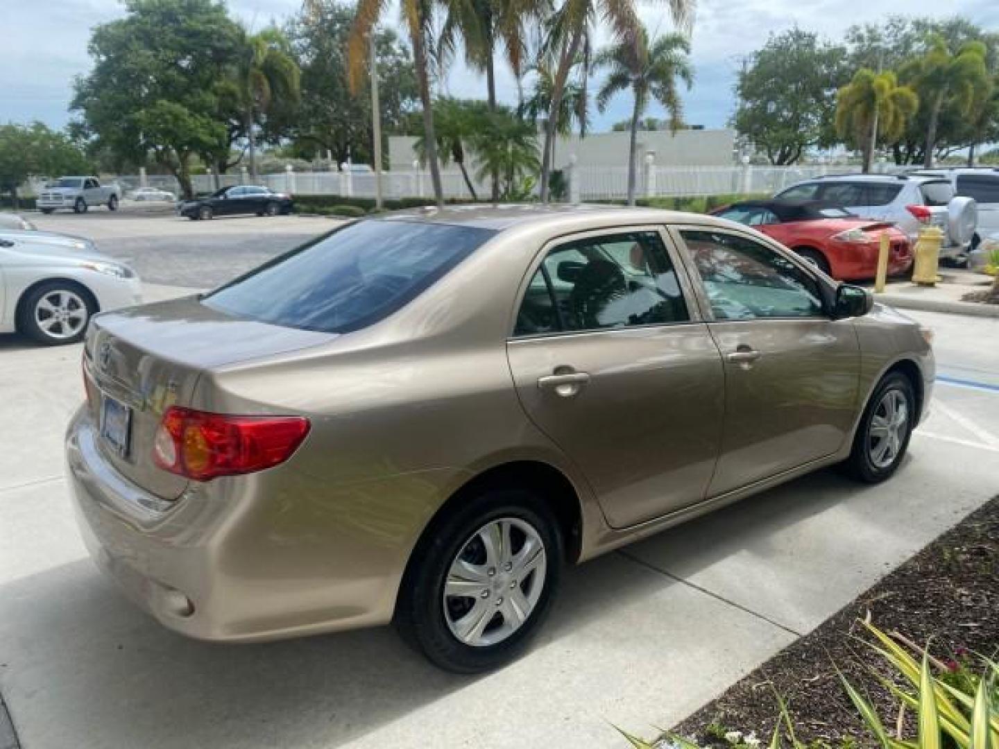 2010 Desert Sand Mica /Bisque Toyota Corolla LE LOW MILES 37,834 (1NXBU4EE1AZ) with an 1.8L DOHC SFI 16-Valve VVT-i 4-Cyl Engine engine, Automatic transmission, located at 4701 North Dixie Hwy, Pompano Beach, FL, 33064, (954) 422-2889, 26.240938, -80.123474 - OUR WEBPAGE FLORIDACARS1.COM HAS OVER 100 PHOTOS AND FREE CARFAX LINK 2010 TOYOTA COROLLA LE 35 mpg VIN: 1NXBU4EE1AZ270742 1 N X B U 4 E E 1 A Z 2 7 0 7 4 2 SEDAN 4 DR 1.8L I4 F DOHC 16V GASOLINE FRONT WHEEL DRIVE Top Features Cloth Seats Satellite Radio Ready Basic Features ABS Brakes AM/FM Stereo - Photo#7