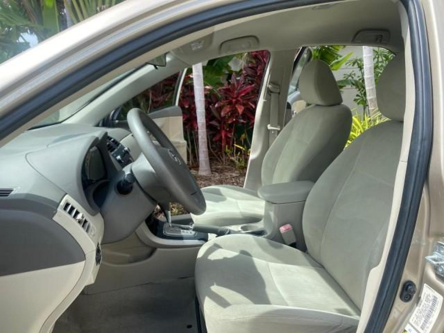 2010 Desert Sand Mica /Bisque Toyota Corolla LE LOW MILES 37,834 (1NXBU4EE1AZ) with an 1.8L DOHC SFI 16-Valve VVT-i 4-Cyl Engine engine, Automatic transmission, located at 4701 North Dixie Hwy, Pompano Beach, FL, 33064, (954) 422-2889, 26.240938, -80.123474 - OUR WEBPAGE FLORIDACARS1.COM HAS OVER 100 PHOTOS AND FREE CARFAX LINK 2010 TOYOTA COROLLA LE 35 mpg VIN: 1NXBU4EE1AZ270742 1 N X B U 4 E E 1 A Z 2 7 0 7 4 2 SEDAN 4 DR 1.8L I4 F DOHC 16V GASOLINE FRONT WHEEL DRIVE Top Features Cloth Seats Satellite Radio Ready Basic Features ABS Brakes AM/FM Stereo - Photo#10