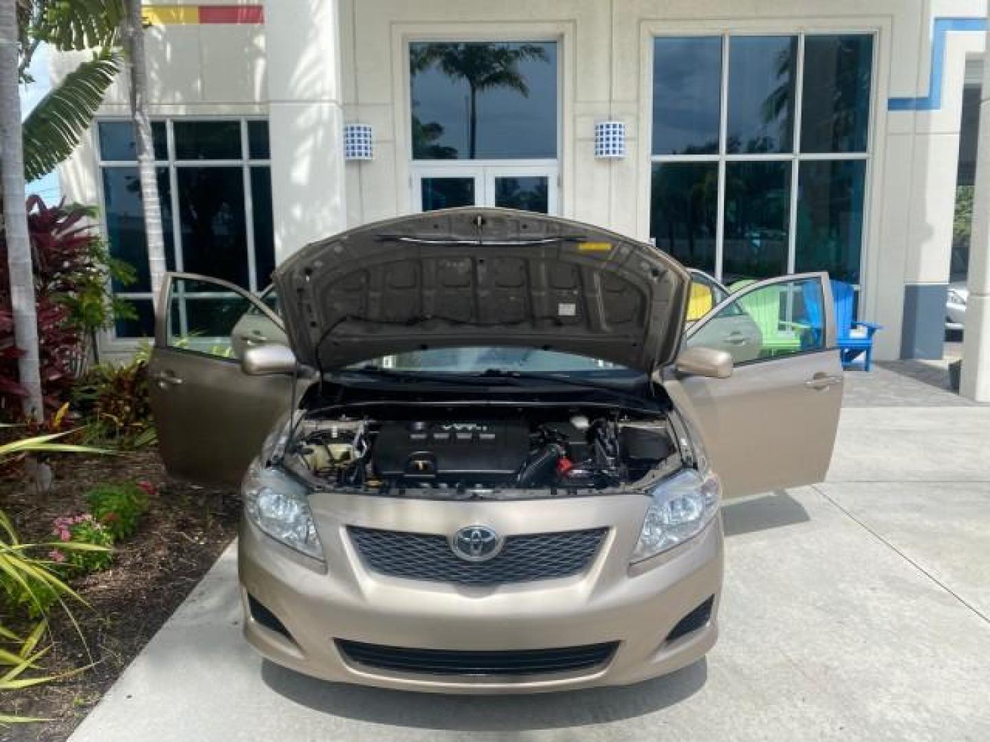 2010 Desert Sand Mica /Bisque Toyota Corolla LE LOW MILES 37,834 (1NXBU4EE1AZ) with an 1.8L DOHC SFI 16-Valve VVT-i 4-Cyl Engine engine, Automatic transmission, located at 4701 North Dixie Hwy, Pompano Beach, FL, 33064, (954) 422-2889, 26.240938, -80.123474 - OUR WEBPAGE FLORIDACARS1.COM HAS OVER 100 PHOTOS AND FREE CARFAX LINK 2010 TOYOTA COROLLA LE 35 mpg VIN: 1NXBU4EE1AZ270742 1 N X B U 4 E E 1 A Z 2 7 0 7 4 2 SEDAN 4 DR 1.8L I4 F DOHC 16V GASOLINE FRONT WHEEL DRIVE Top Features Cloth Seats Satellite Radio Ready Basic Features ABS Brakes AM/FM Stereo - Photo#16