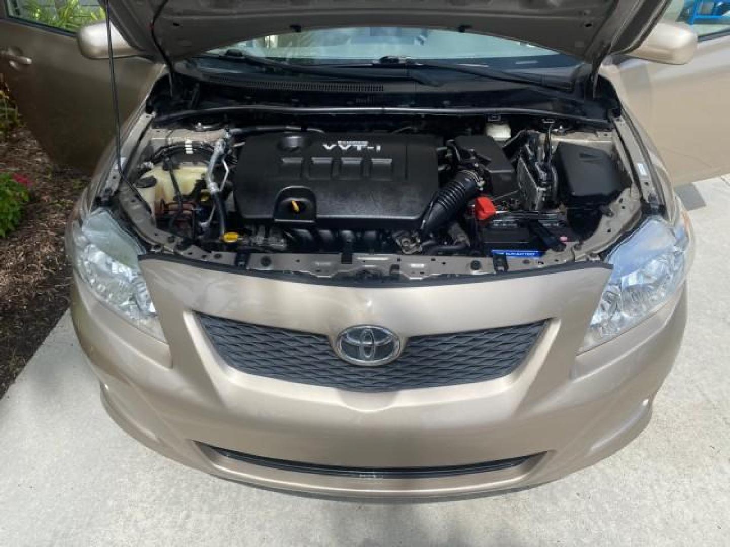 2010 Desert Sand Mica /Bisque Toyota Corolla LE LOW MILES 37,834 (1NXBU4EE1AZ) with an 1.8L DOHC SFI 16-Valve VVT-i 4-Cyl Engine engine, Automatic transmission, located at 4701 North Dixie Hwy, Pompano Beach, FL, 33064, (954) 422-2889, 26.240938, -80.123474 - OUR WEBPAGE FLORIDACARS1.COM HAS OVER 100 PHOTOS AND FREE CARFAX LINK 2010 TOYOTA COROLLA LE 35 mpg VIN: 1NXBU4EE1AZ270742 1 N X B U 4 E E 1 A Z 2 7 0 7 4 2 SEDAN 4 DR 1.8L I4 F DOHC 16V GASOLINE FRONT WHEEL DRIVE Top Features Cloth Seats Satellite Radio Ready Basic Features ABS Brakes AM/FM Stereo - Photo#17
