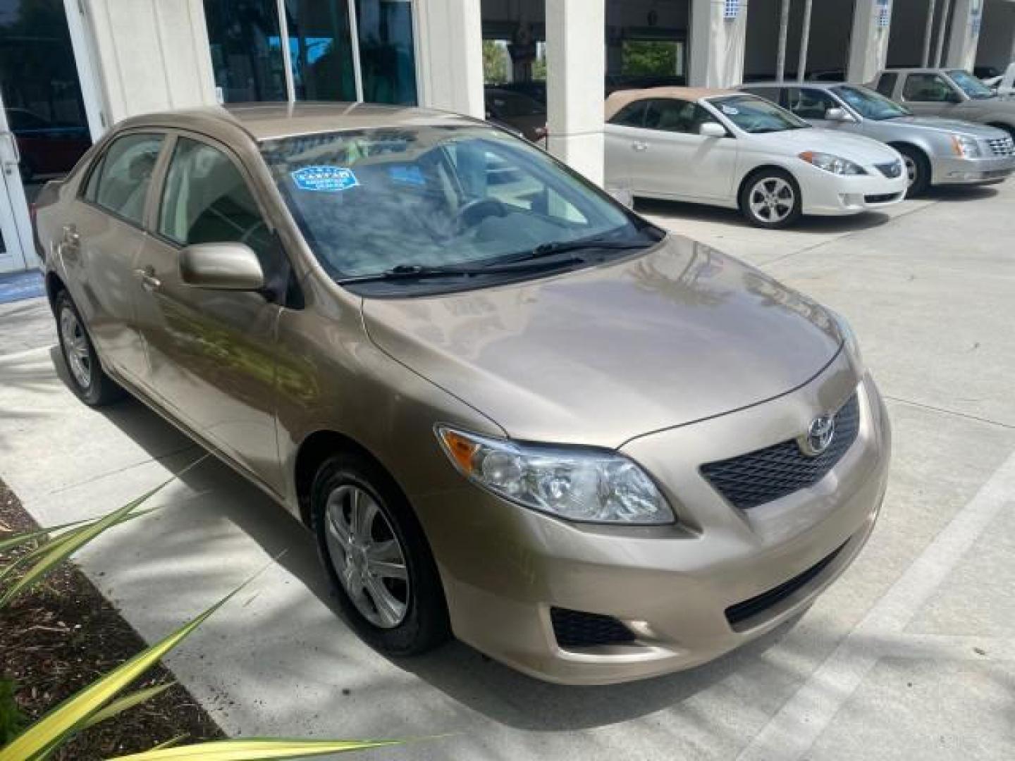 2010 Desert Sand Mica /Bisque Toyota Corolla LE LOW MILES 37,834 (1NXBU4EE1AZ) with an 1.8L DOHC SFI 16-Valve VVT-i 4-Cyl Engine engine, Automatic transmission, located at 4701 North Dixie Hwy, Pompano Beach, FL, 33064, (954) 422-2889, 26.240938, -80.123474 - OUR WEBPAGE FLORIDACARS1.COM HAS OVER 100 PHOTOS AND FREE CARFAX LINK 2010 TOYOTA COROLLA LE 35 mpg VIN: 1NXBU4EE1AZ270742 1 N X B U 4 E E 1 A Z 2 7 0 7 4 2 SEDAN 4 DR 1.8L I4 F DOHC 16V GASOLINE FRONT WHEEL DRIVE Top Features Cloth Seats Satellite Radio Ready Basic Features ABS Brakes AM/FM Stereo - Photo#24